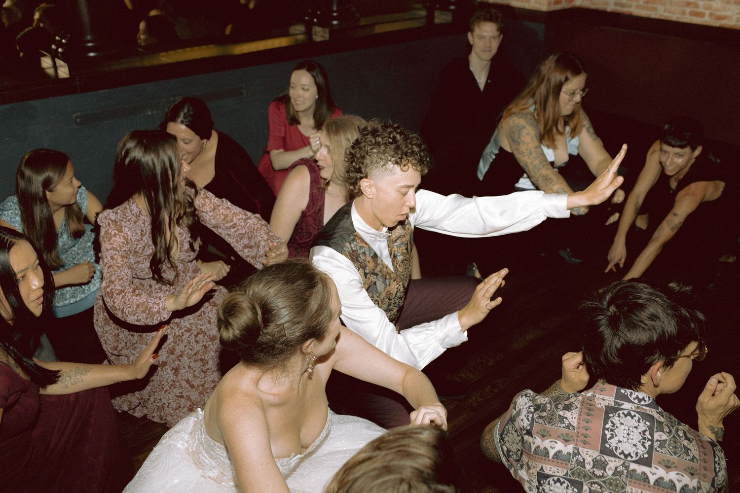 Guests dancing at queer wedding reception Granite Brewery Toronto