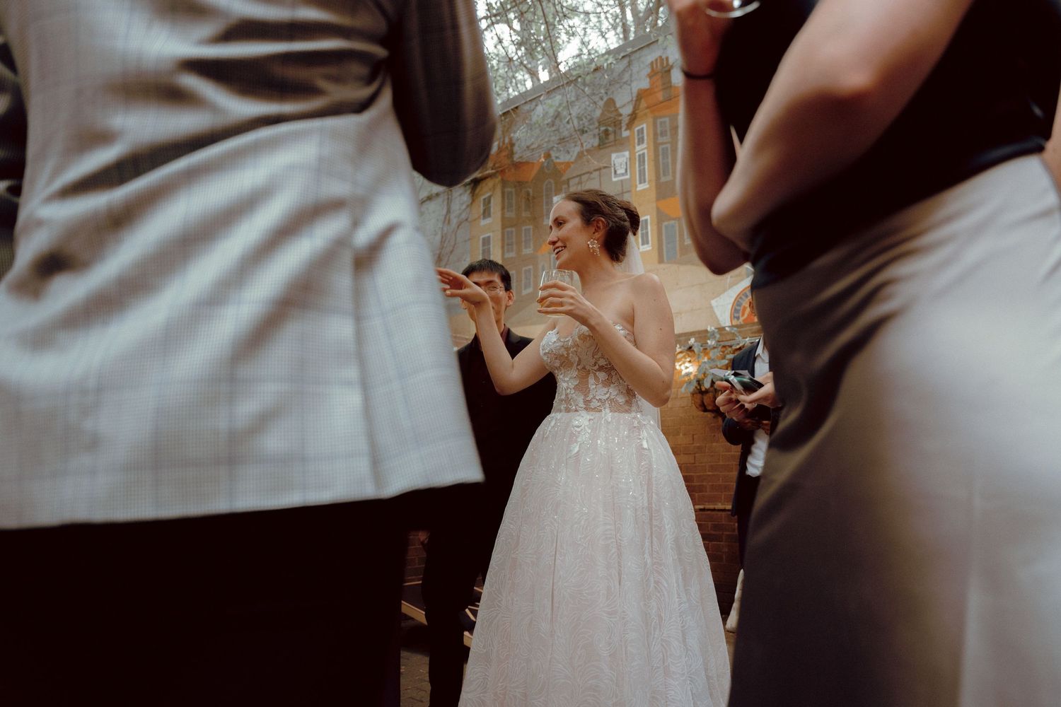 Wedding couple mingling with guests at Granite Brewery Toronto reception