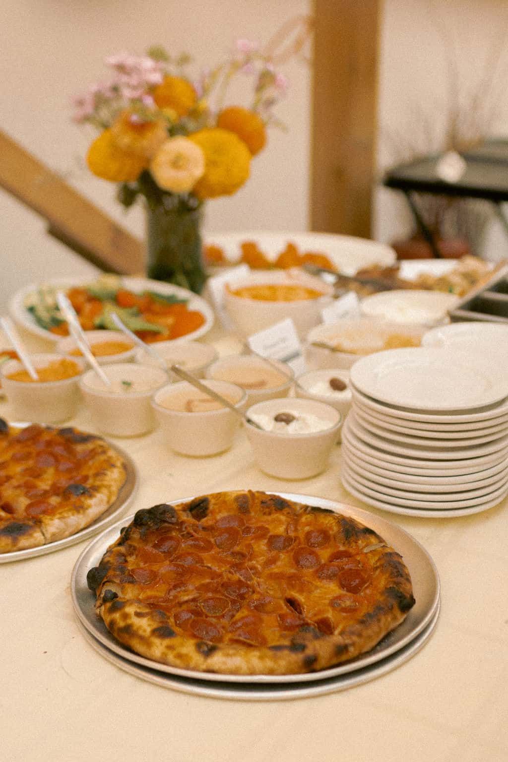 Mediterranean food and pizza served at Bar Neon private event