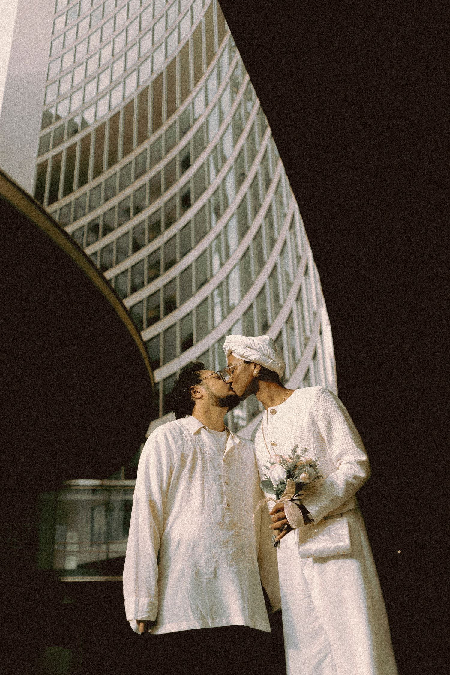 Intimate transgender wedding portraits at Toronto City Hall downtown