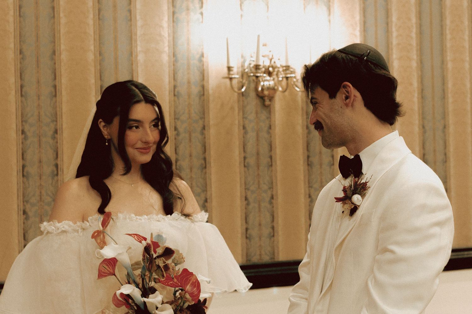 bride and groom first look at Old Mill Toronto wedding