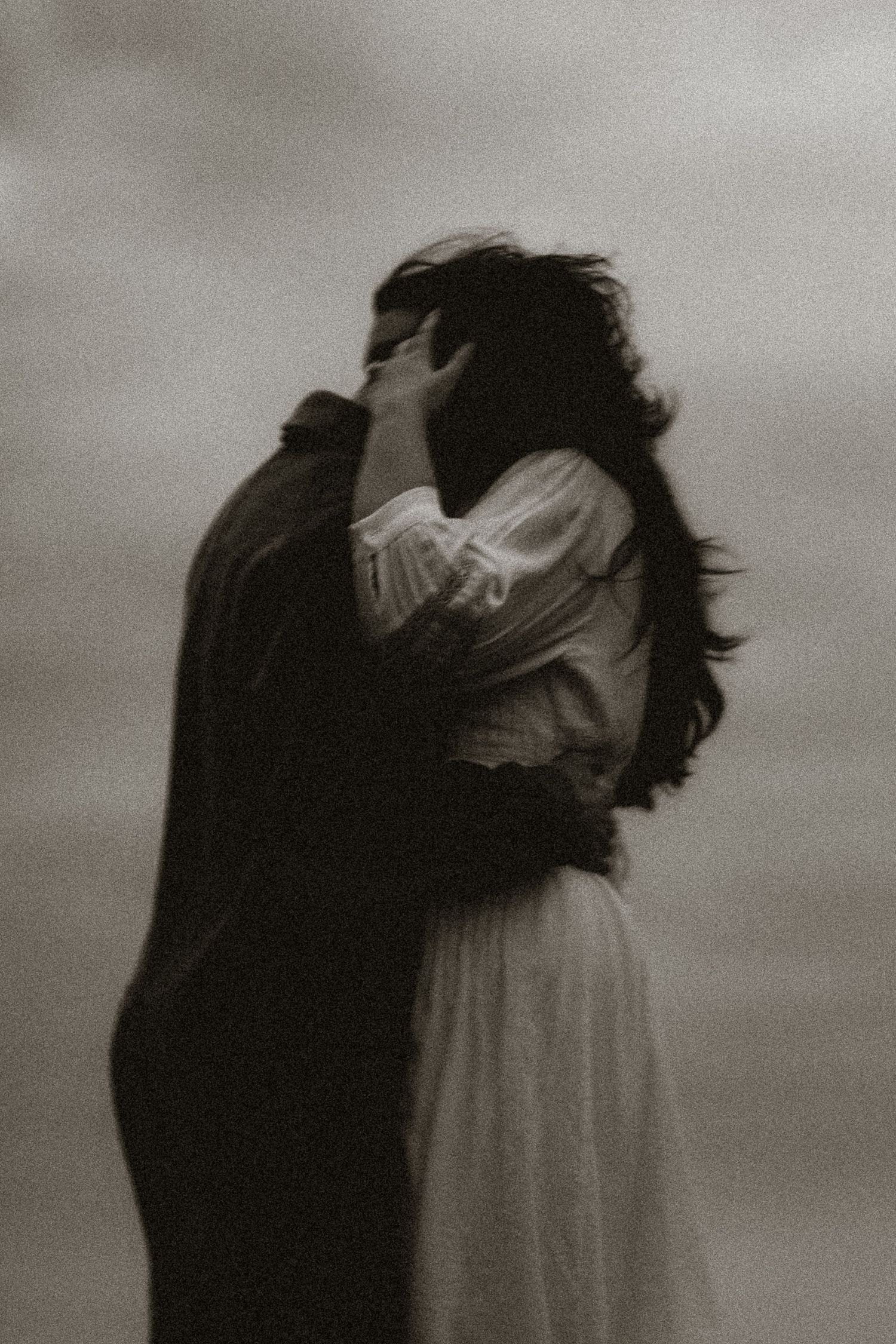 Olivia and Zane engagement session from their home to Queen West and Scarborough Bluffs, moody, unposed, intimate couple photos in Toronto.