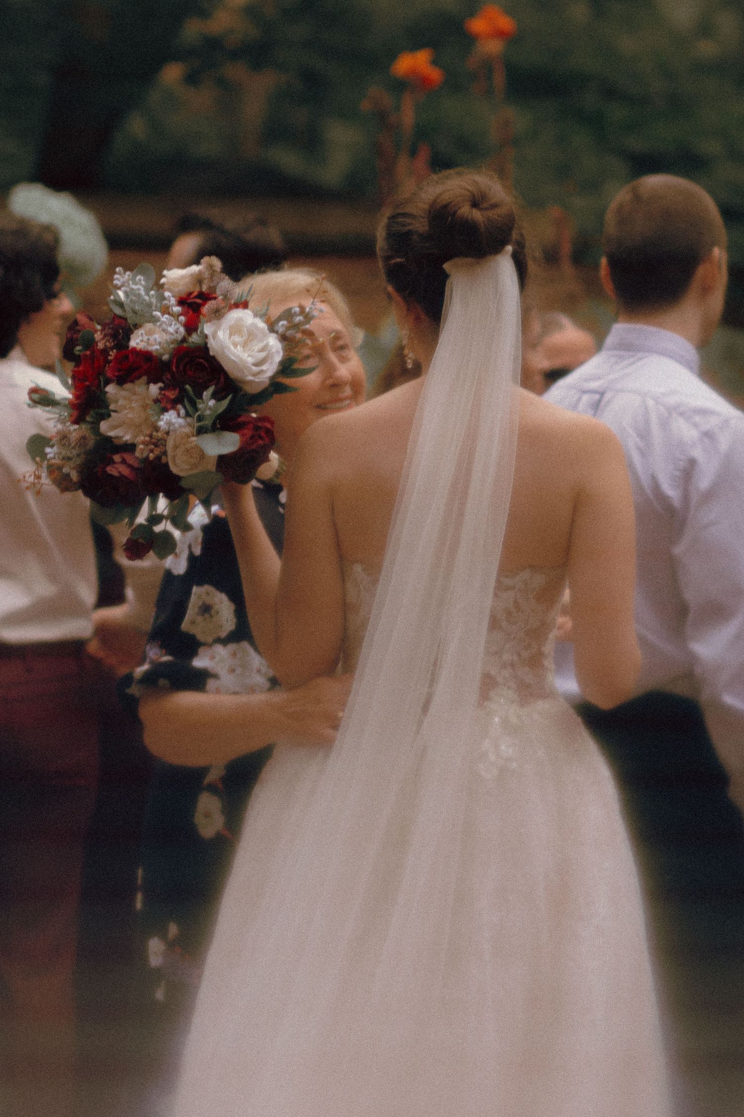 queer Wedding couple mingling with guests at Granite Brewery Toronto after ceremony