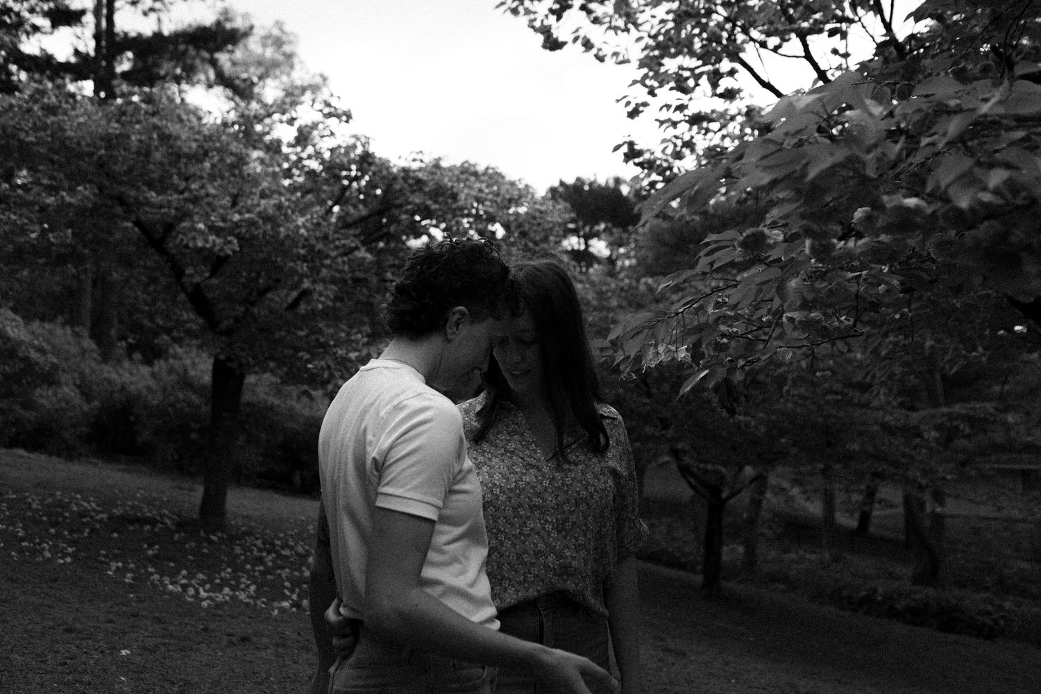 Lesbian American Couple’s Engagement Photoshoot at High Park in Toronto during Cherry Blossom