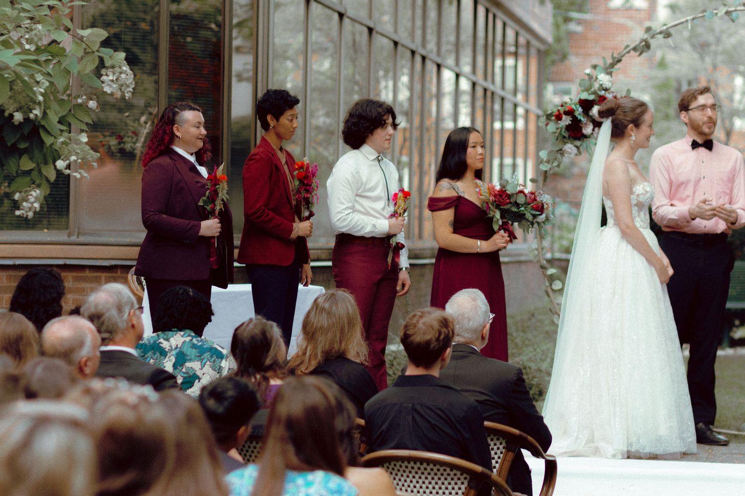 Outdoor ceremony in courtyard at Granite Brewery Toronto surrounded by September greenery