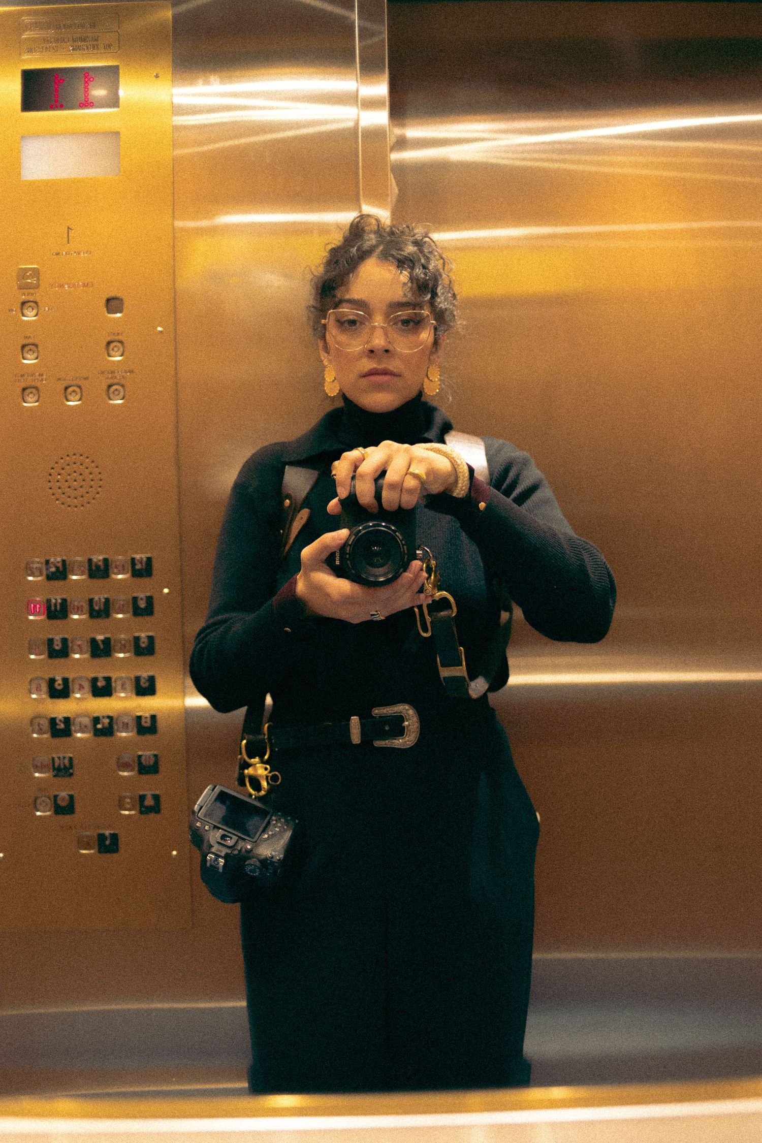 Portrait of Jaqueline Silva, a Brazilian-Canadian Toronto-based intimate wedding and portrait photographer and visual artist.