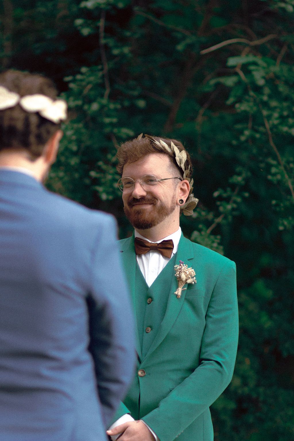 Outdoor garden ceremony surrounded by lush summer greenery at Fantasy Farm Toronto same-sex wedding