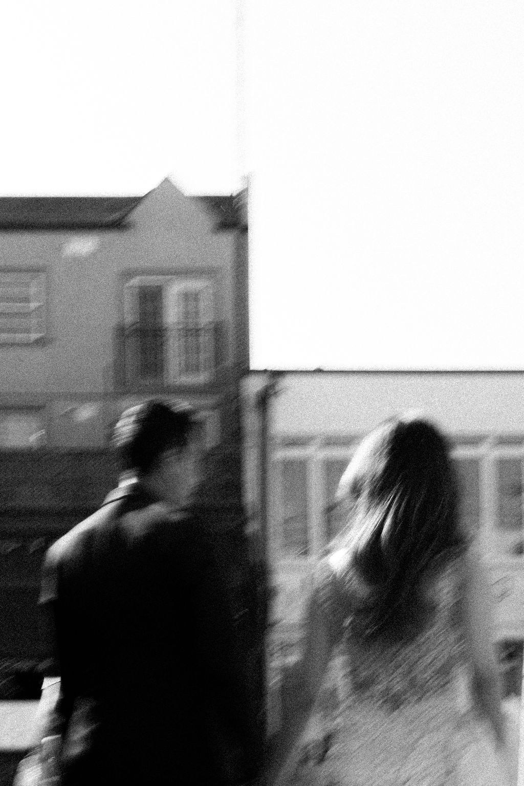 Documentary style wedding photo inside restaurant in Kensington Market Toronto