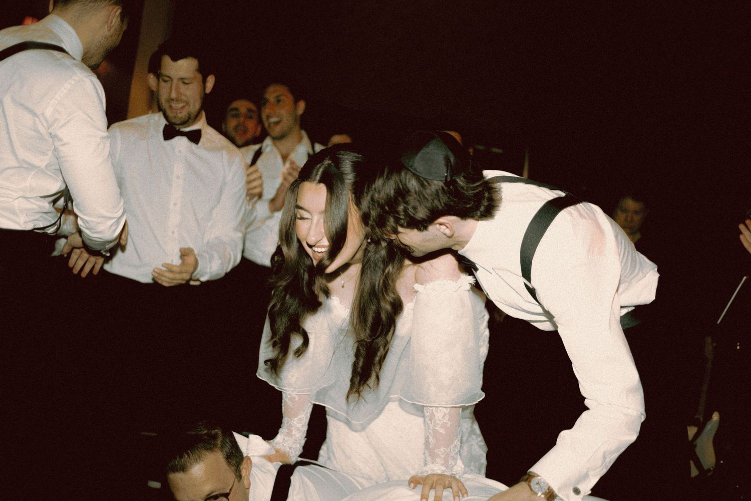Bride and Groom during Jewish hora at Old Mill Toronto Fall wedding