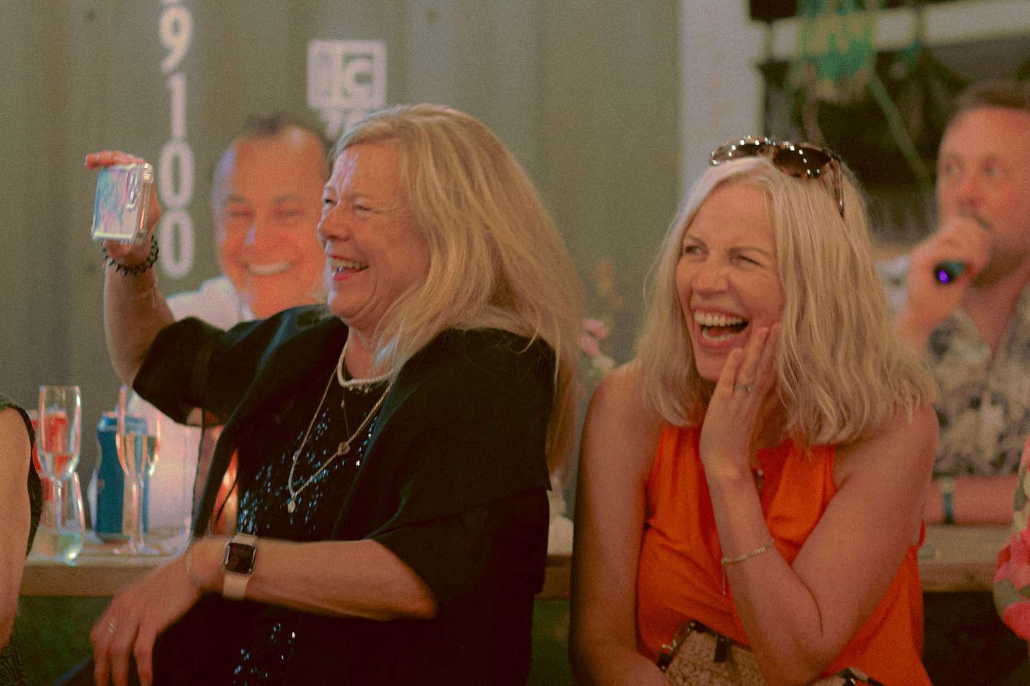 Emotional family moment during queer LGBTQ+ commitment ceremony at Bar Neon Toronto