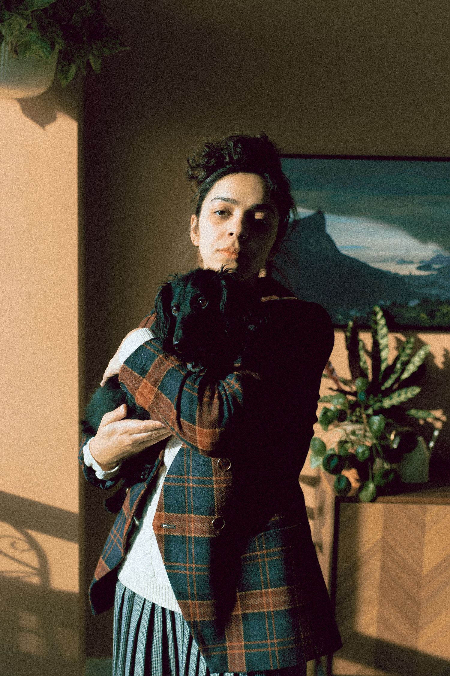 Portrait of Jaqueline Silva, a Brazilian-Canadian Toronto-based intimate wedding and portrait photographer and visual artist.
