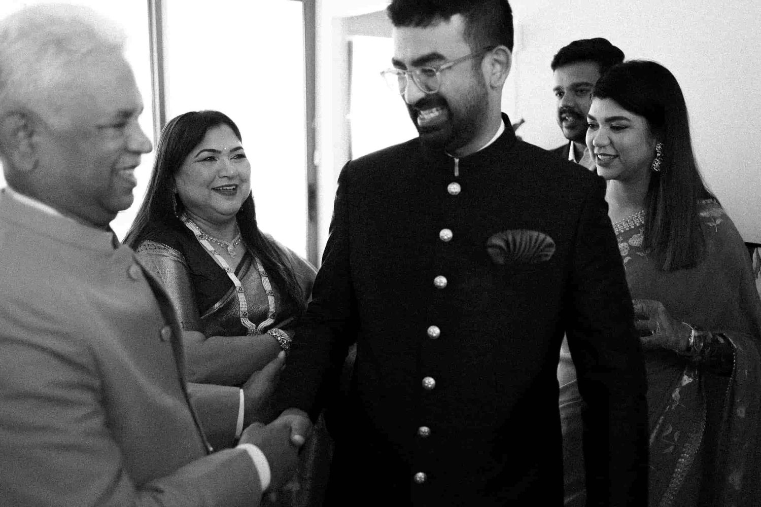 South Asian family preparing together before the wedding ceremony.