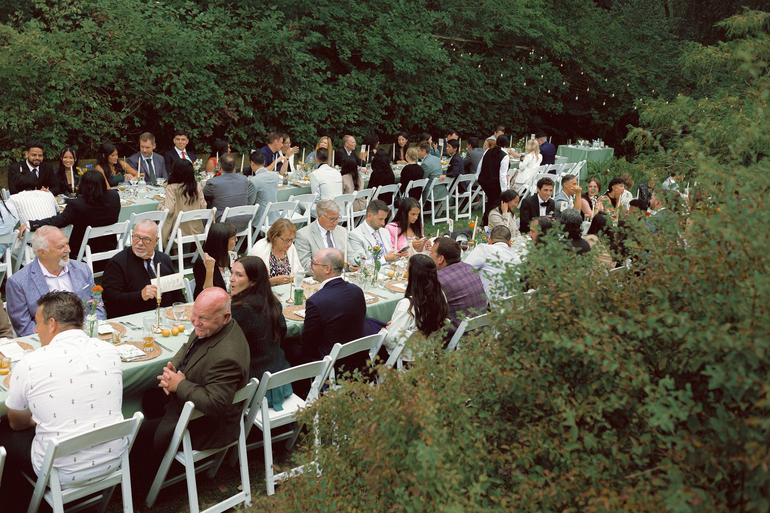 Outdoor wedding dinner set up on Toronto Island
