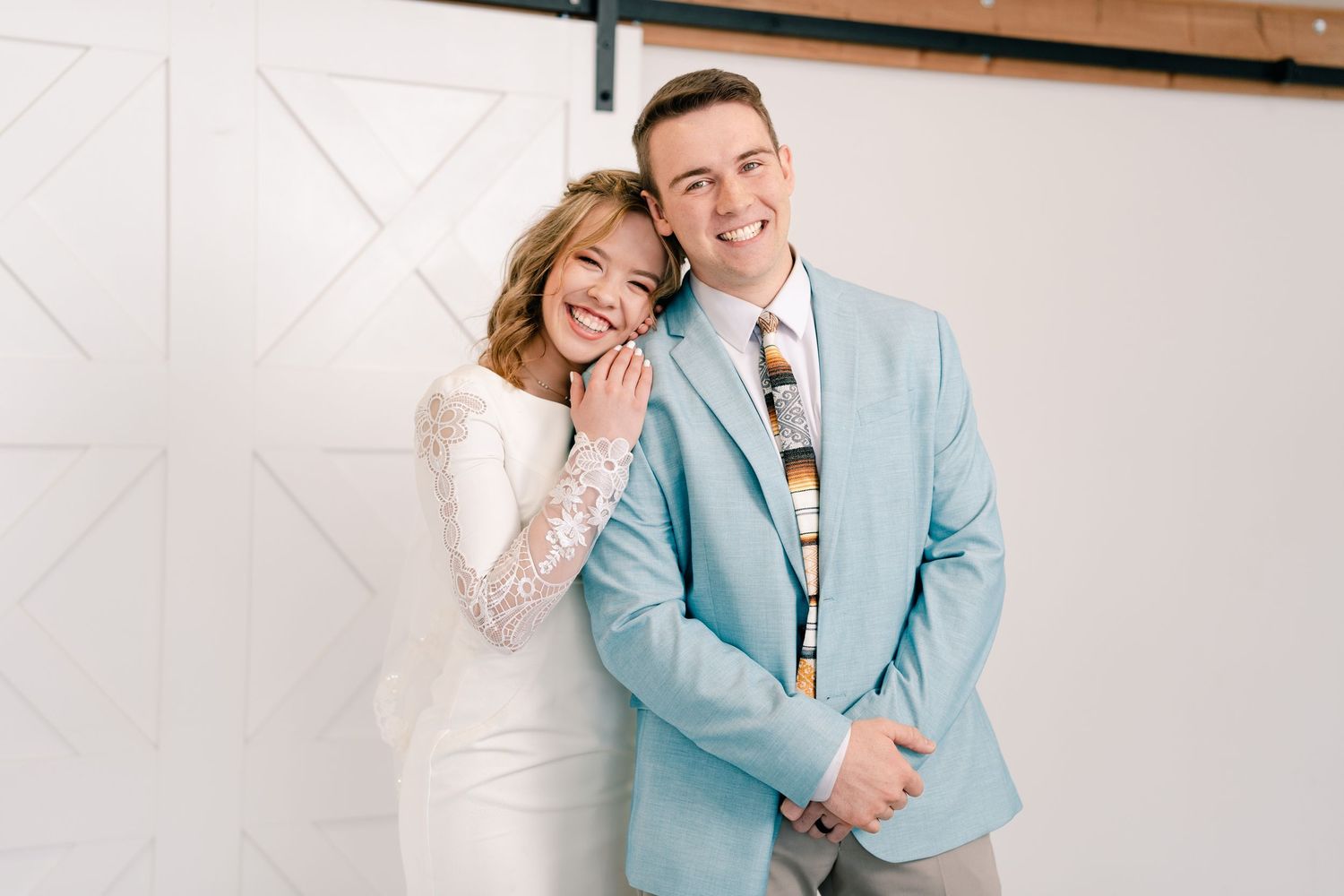 Des Moines studio wedding portraits - bride and groom romantic portrait with real, genuine smiles.