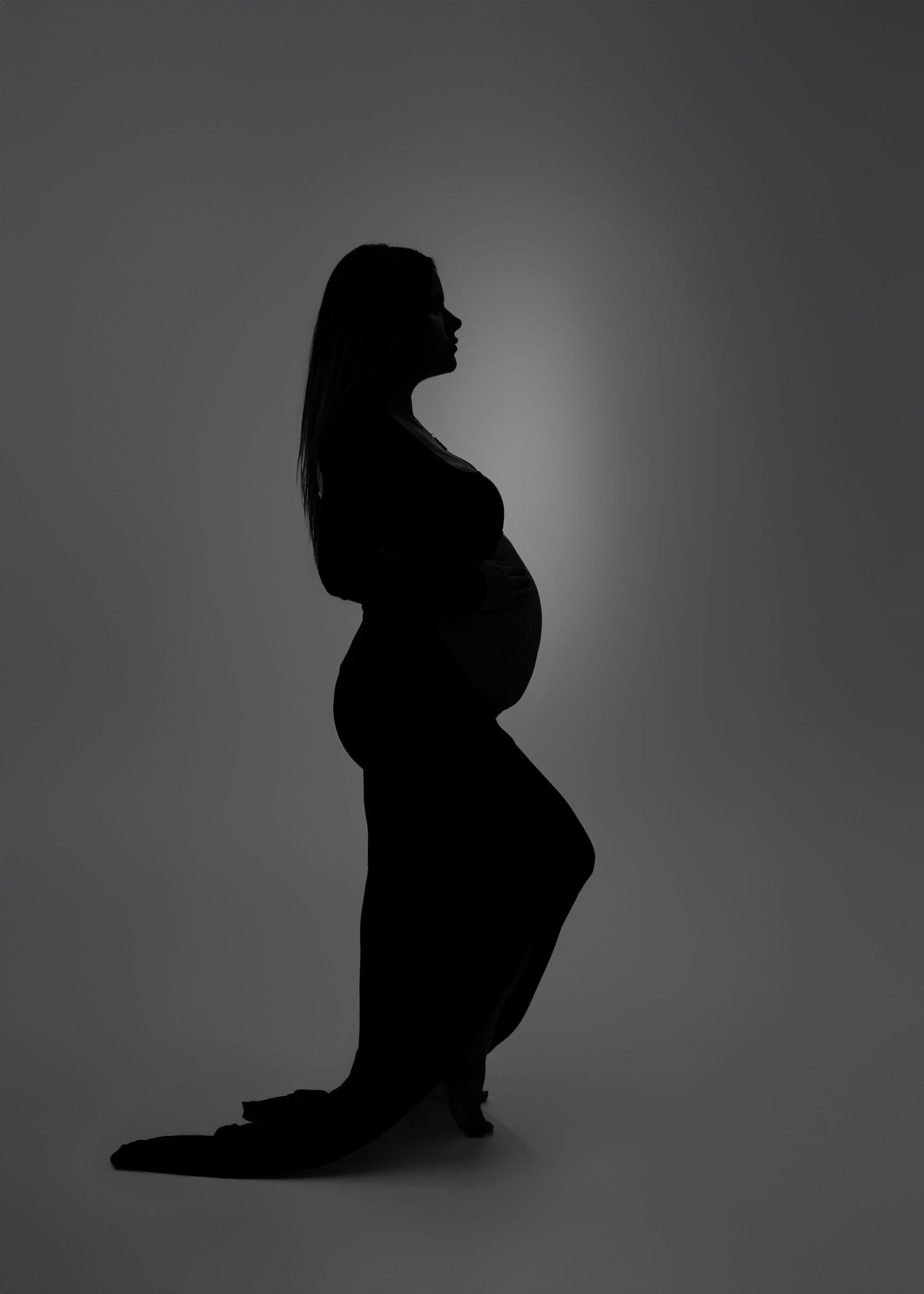 A series of silhouettes showing a figure in various yoga or stretching poses against a gradient gray background.