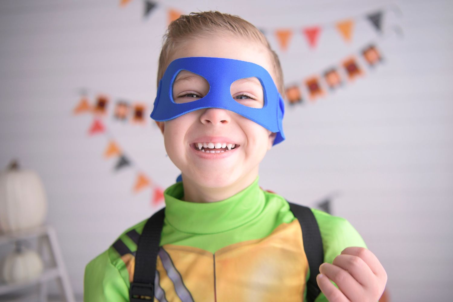 Ninja Turtle mask on a child portrait for Mesa AZ Halloween Mini Session Photos in natural light