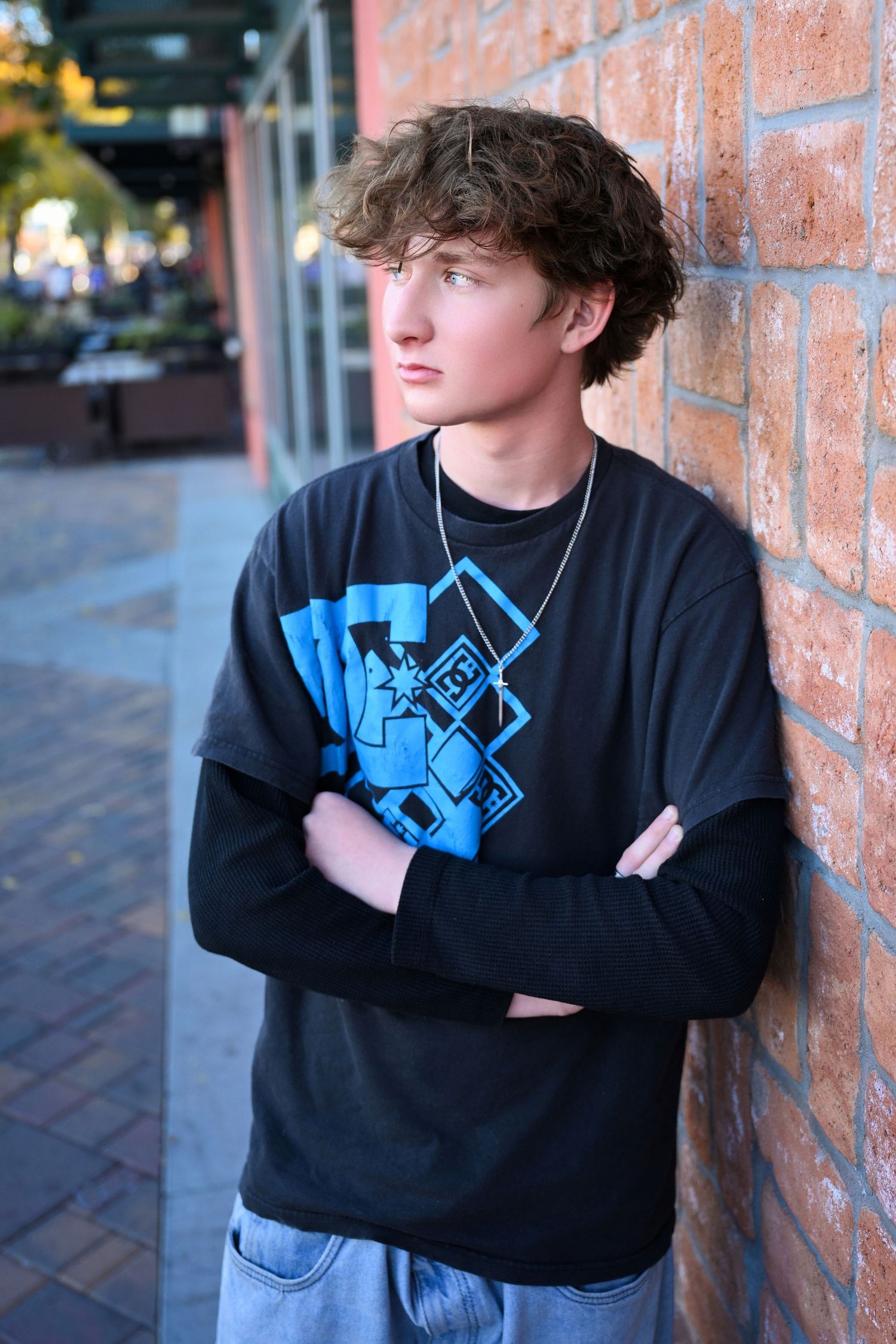 Arizona Senior Photo Photographer Phoenix Grad Photos Boy on brick wall Golden Hour Blue Hour Outdoor candid natural photography in AZ
