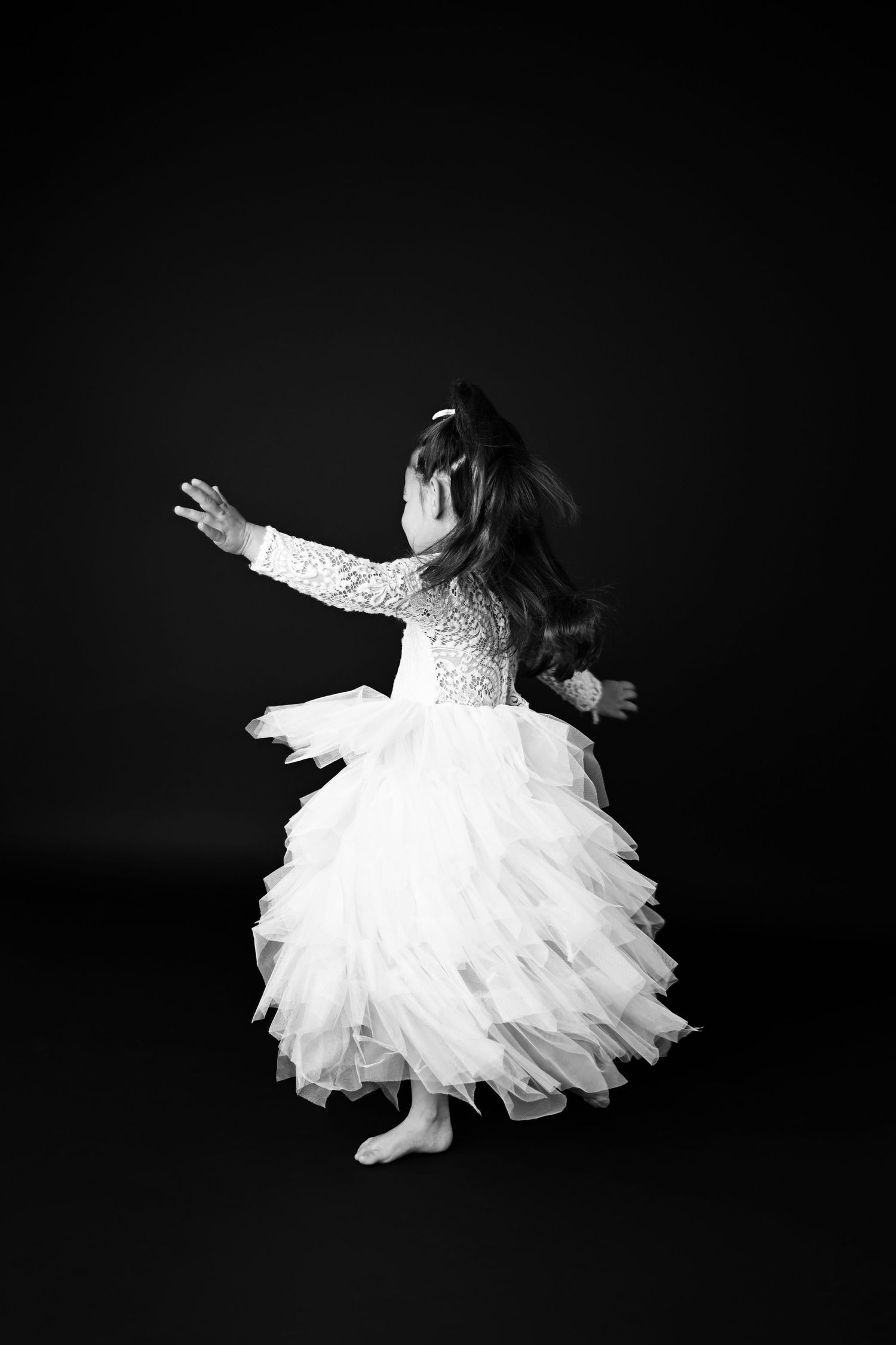 Spinning and twirling in Client Closet gown Arizona Artful Imagery