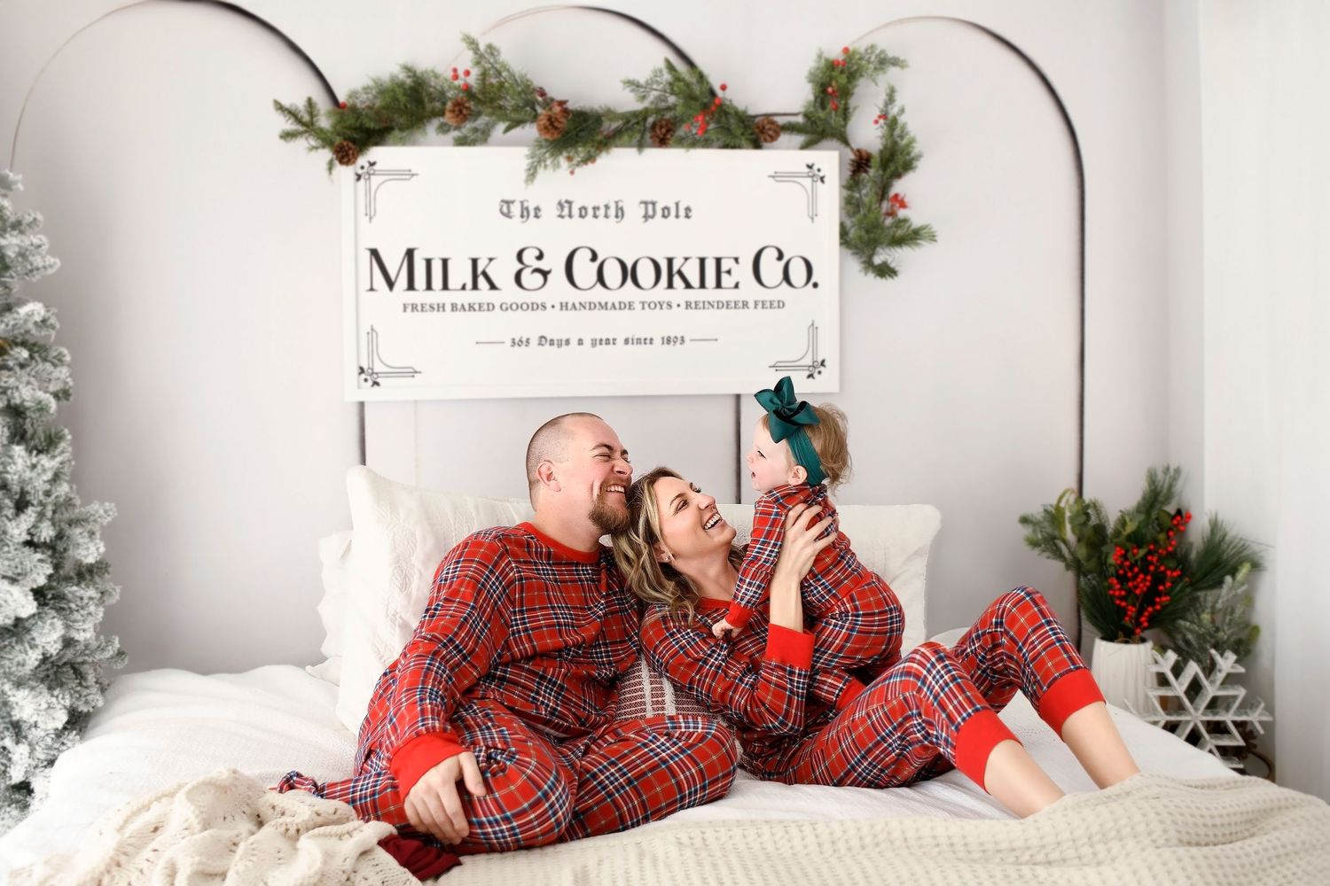 Lifestyle Christmas Photo of family in Christmas Pajamas for Mini Session in Ahwatukee Phoenix Arizona