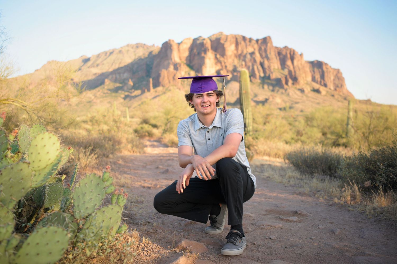 Superstition Mountain Arizona Apache Junction Desert Senior Graduation Professional photos Cap and Gown Teen boy Professional photos Phoenix