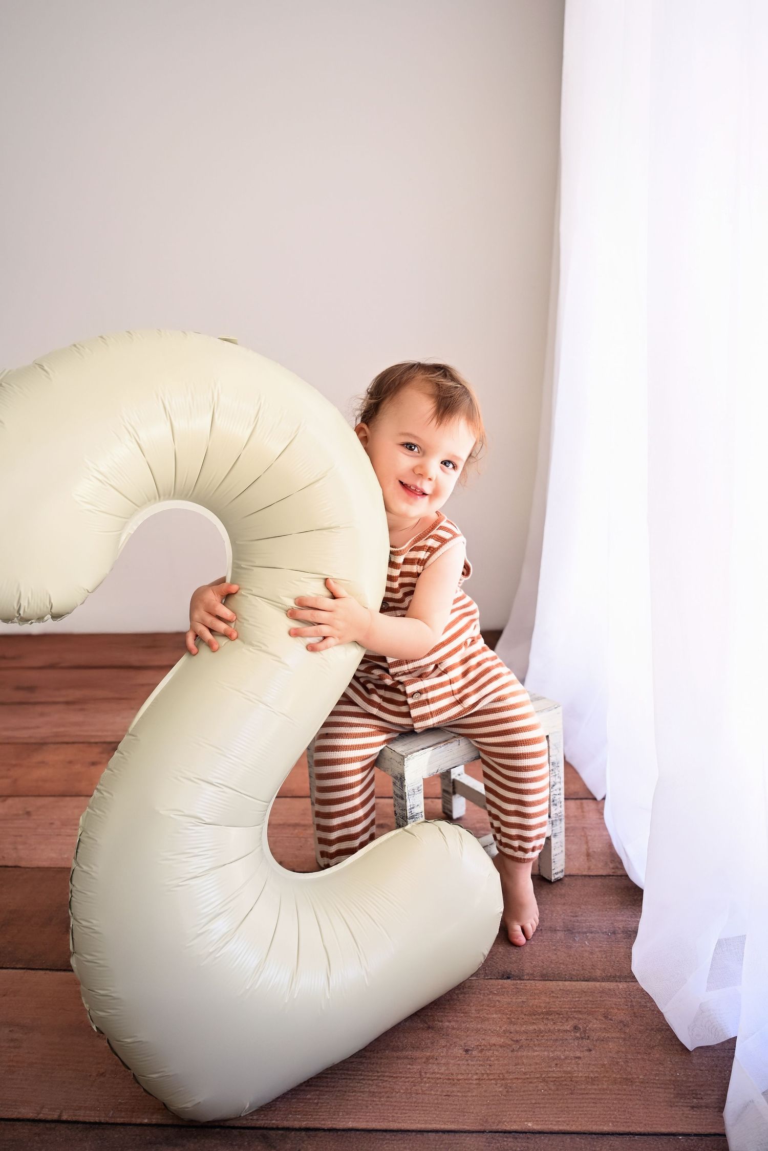 Two Year Photoshoot with balloon in Natural Light Arizona ALl White Photoshoot