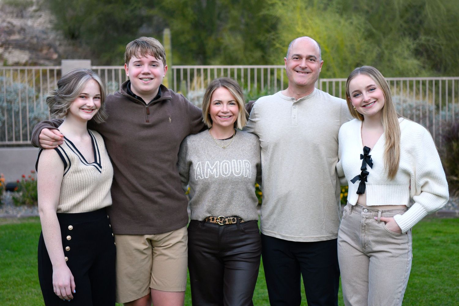Family of 5 poses in their own Ahwatukee Arizona backyard for Christmas Card photo