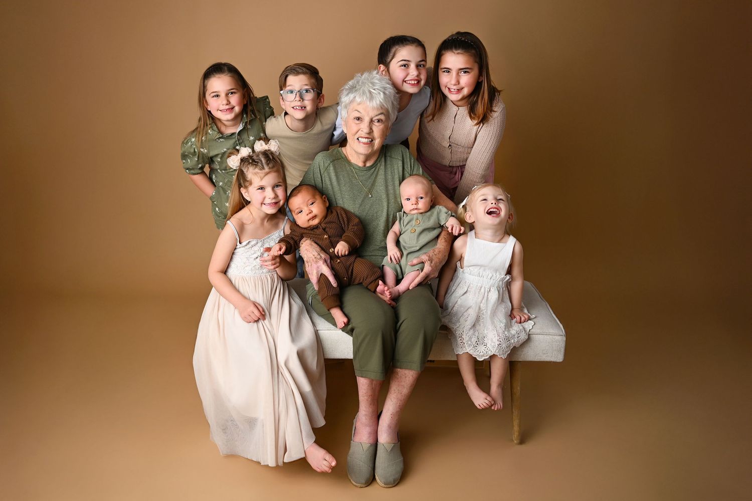 Large extended family session with great grandmother and lots of children in Phoenix Studio