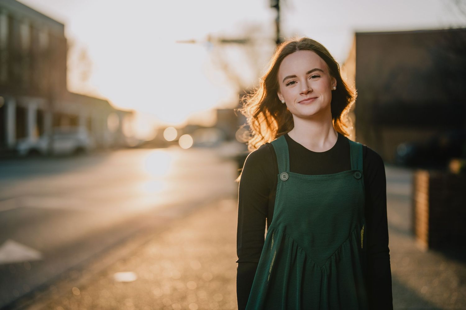 Sunset street portrait in green dress with golden hour lighting. Nashville, Tennessee.