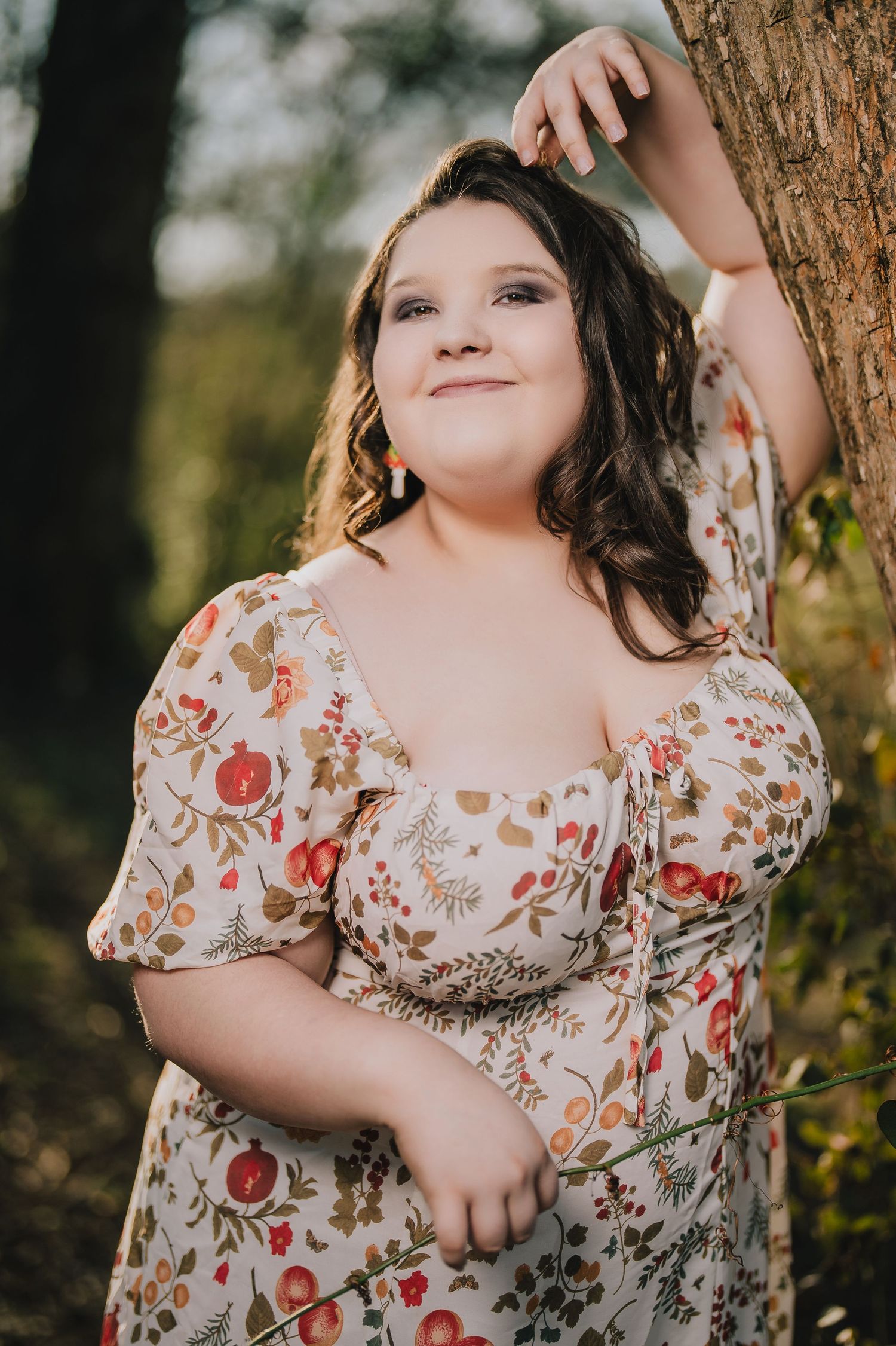 Natural outdoor portrait in floral dress with romantic cottagecore styling. Nashville, Tennessee.