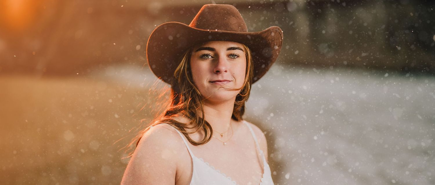 Warm sunset portrait in cowboy hat with soft golden lighting. Nashville, Tennessee.