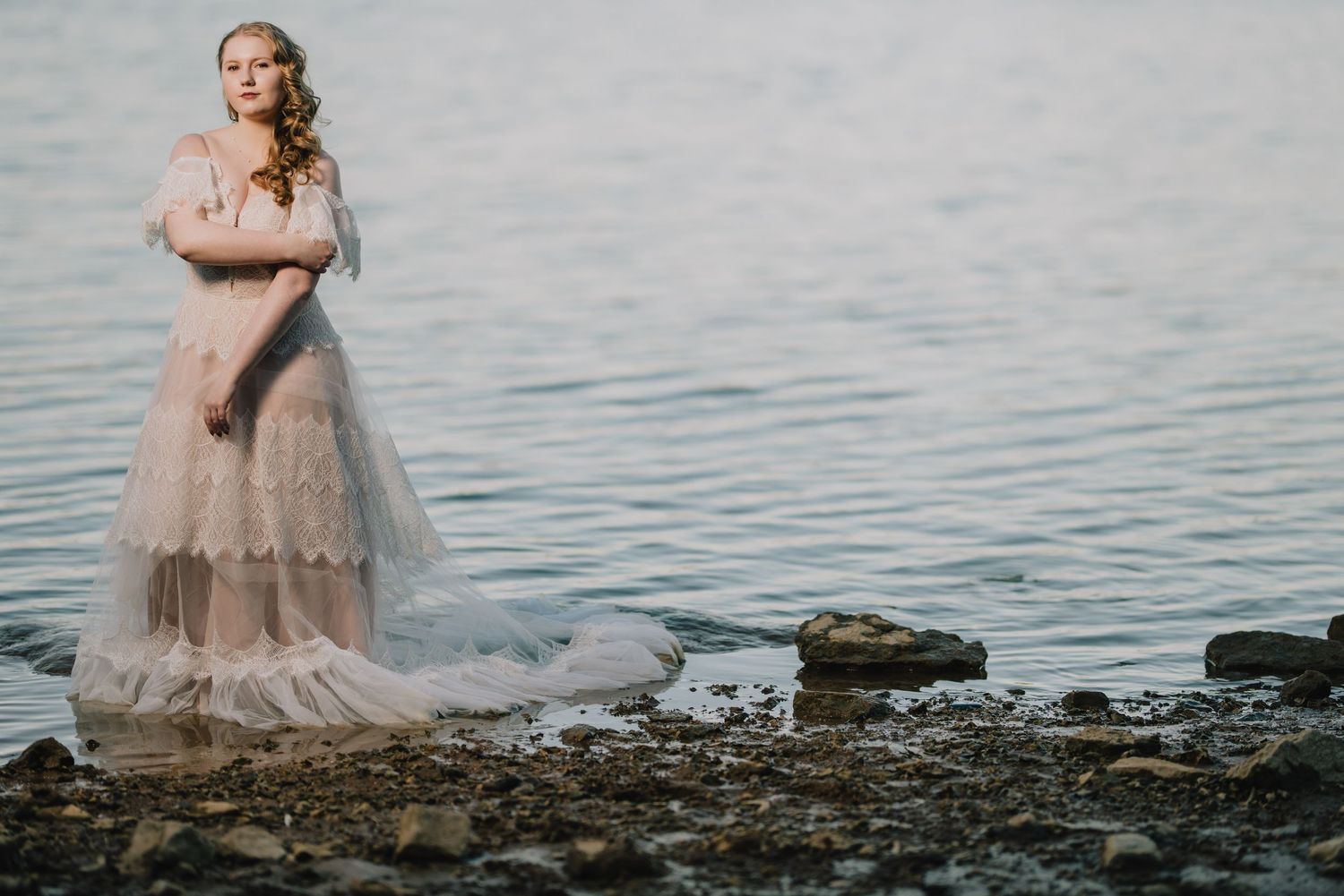 Ethereal portrait session by a misty waterfront with vintage-inspired dress. Nashville, Tennessee.