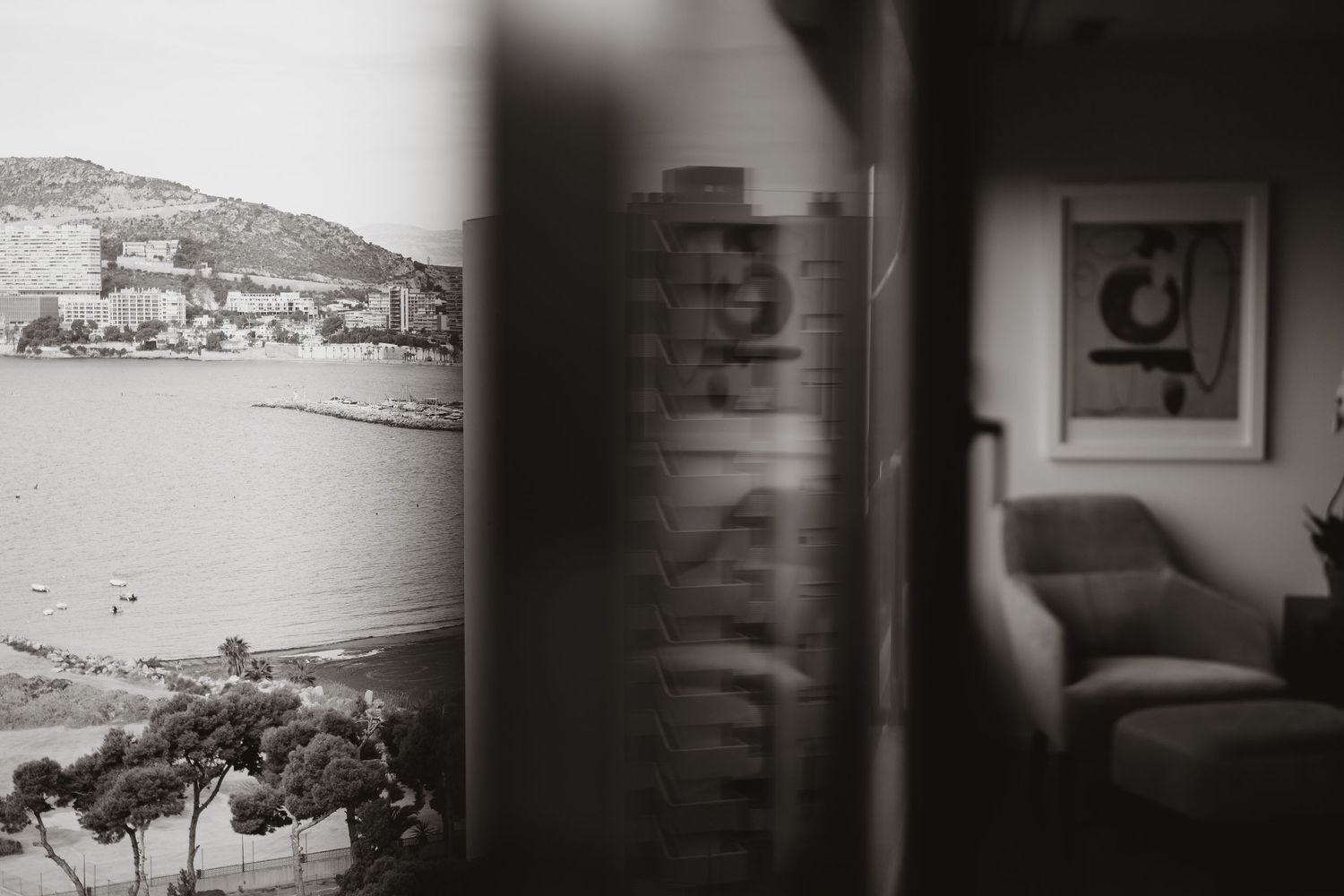 Vintage black and white photograph displayed in an interior setting.