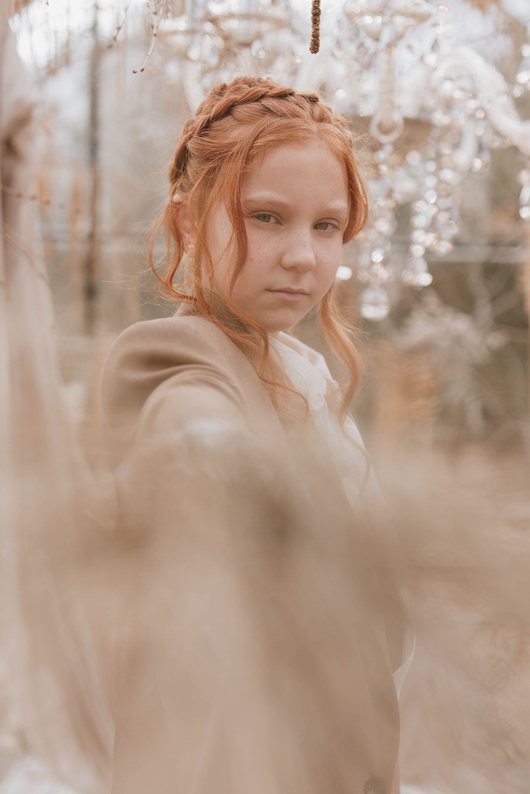 Dreamy portrait with soft focus and crystal decorations in warm autumn tones.
