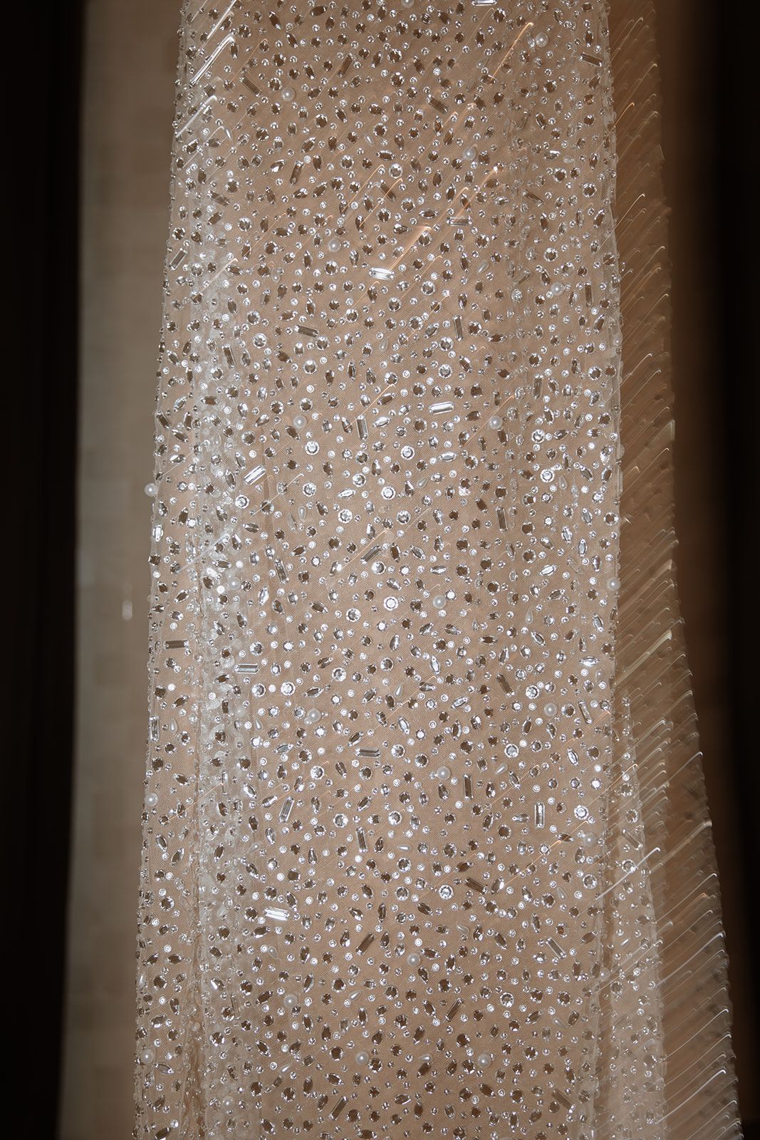 Close-up detail shot of water droplets on a shiny surface creating a sparkling effect.
