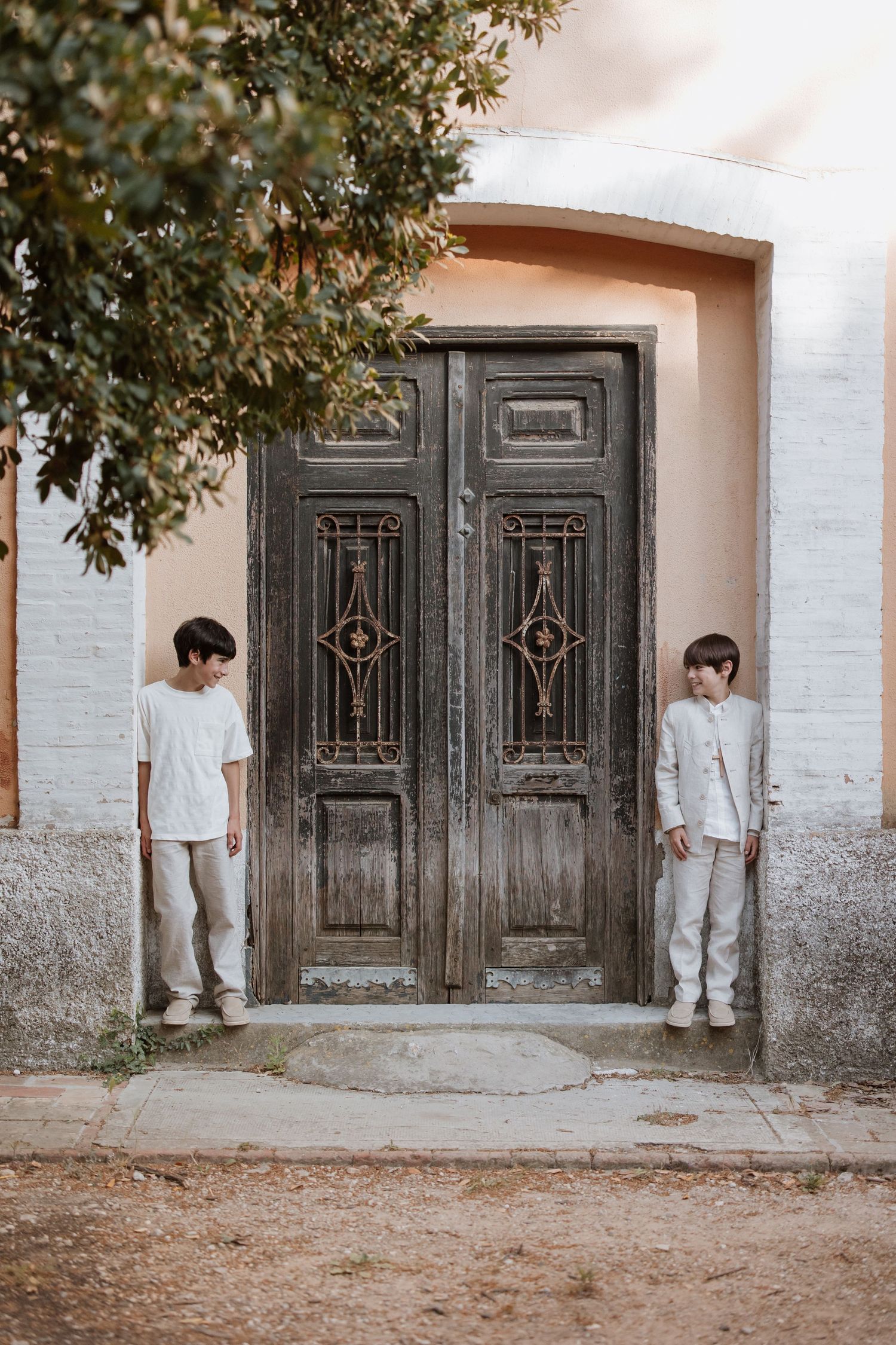 A split view showing a figure standing against a white wall beside ornate dark wooden doors in multiple poses.