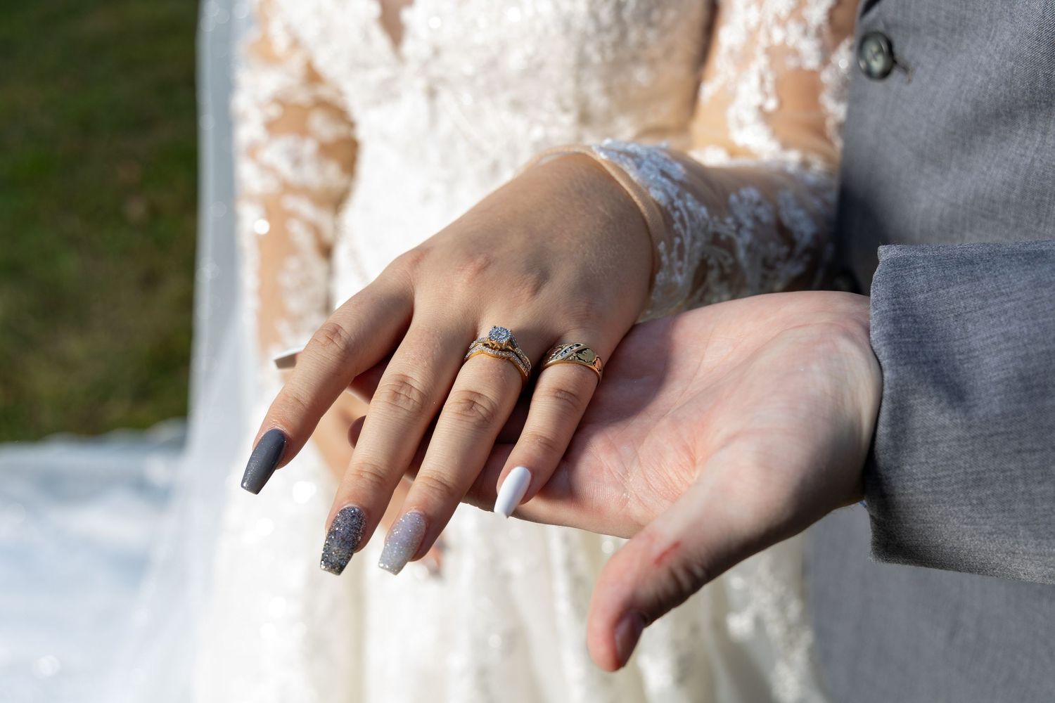 Close-up sequence of hands holding and lighting a cigarette with a lighter against a blurred background.