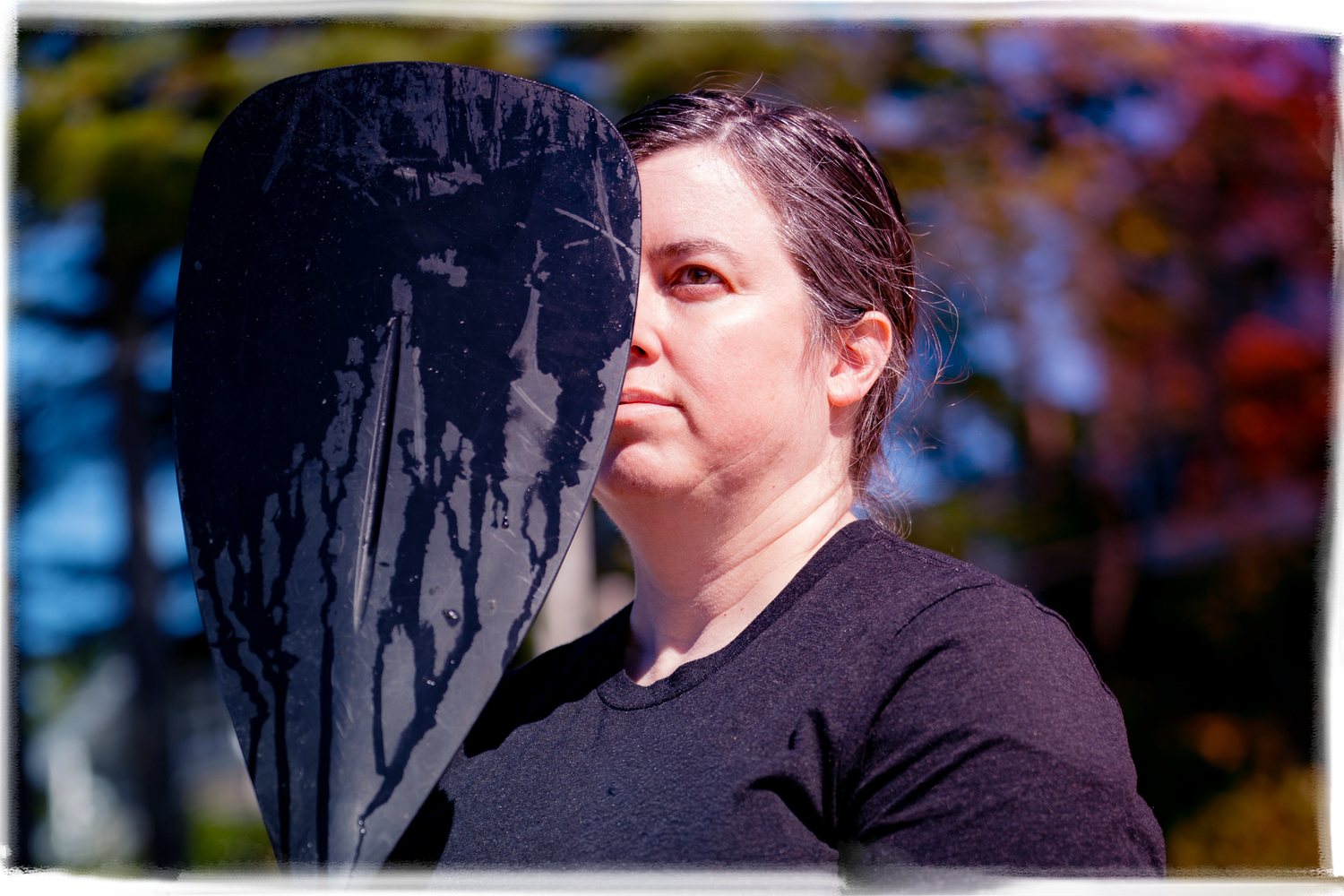 A series of outdoor portrait shots taken during autumn with colorful foliage in the background.