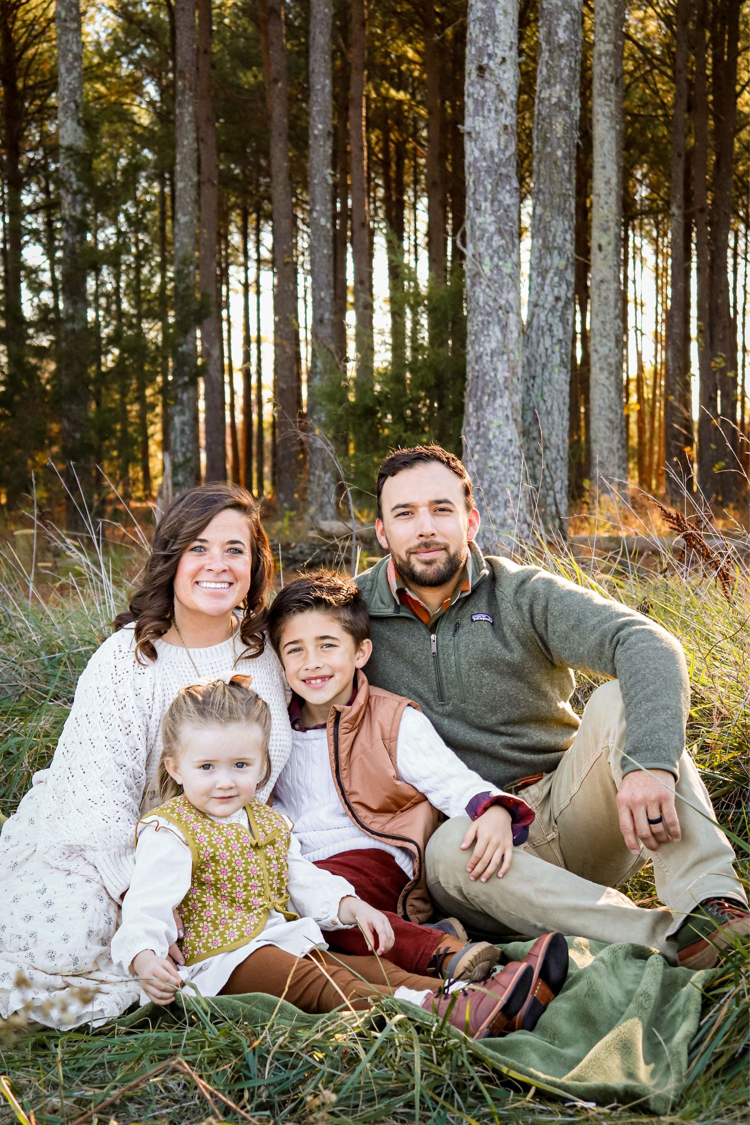 Lifestyle family session with four people, photographed in natural light.