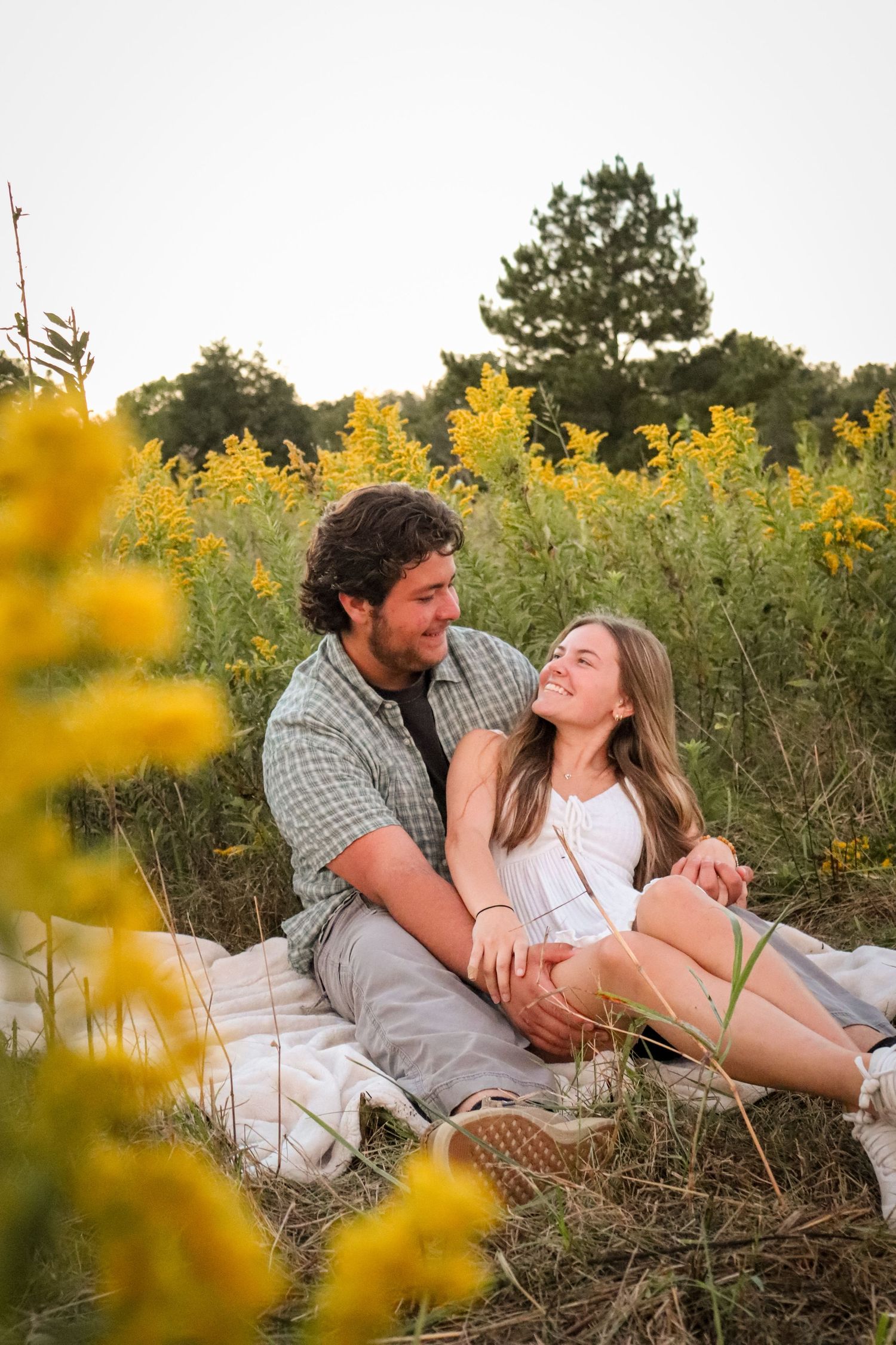 couple session taken outdoors in natural light, candid photography style.