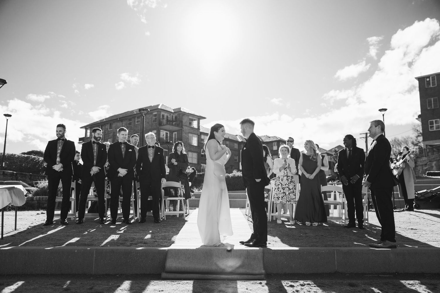 Sydney civil wedding ceremony at Blues Point Reserve, capturing the couple's romantic vows, candid moments and stunning Sydney Harbour views