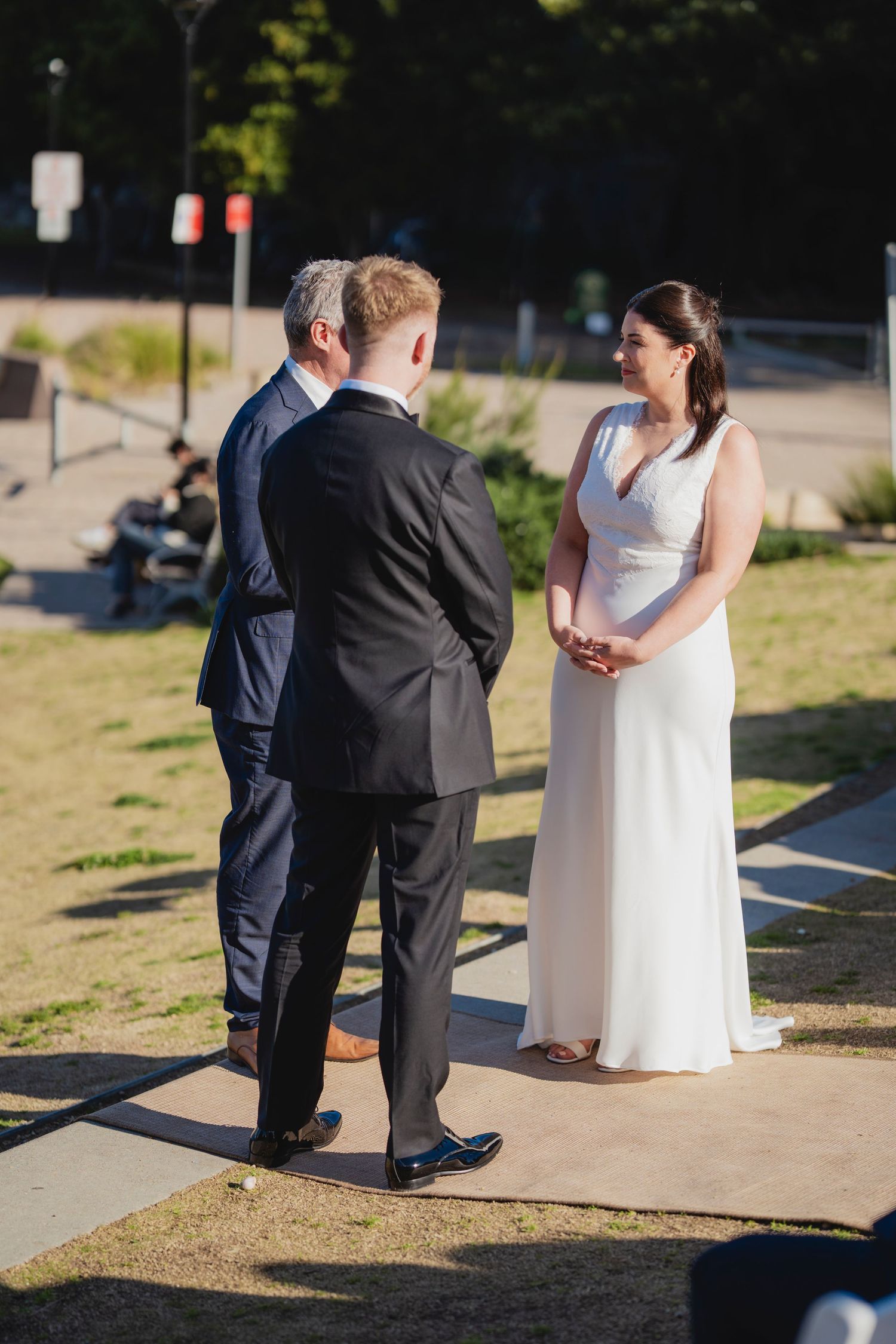 Sydney civil wedding ceremony at Blues Point Reserve, capturing the couple's romantic vows, candid moments and stunning Sydney Harbour views