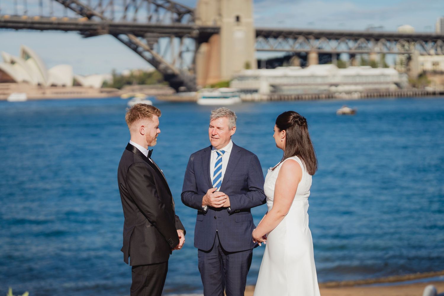 Sydney civil wedding ceremony at Blues Point Reserve, capturing the couple's romantic vows, candid moments and stunning Sydney Harbour views