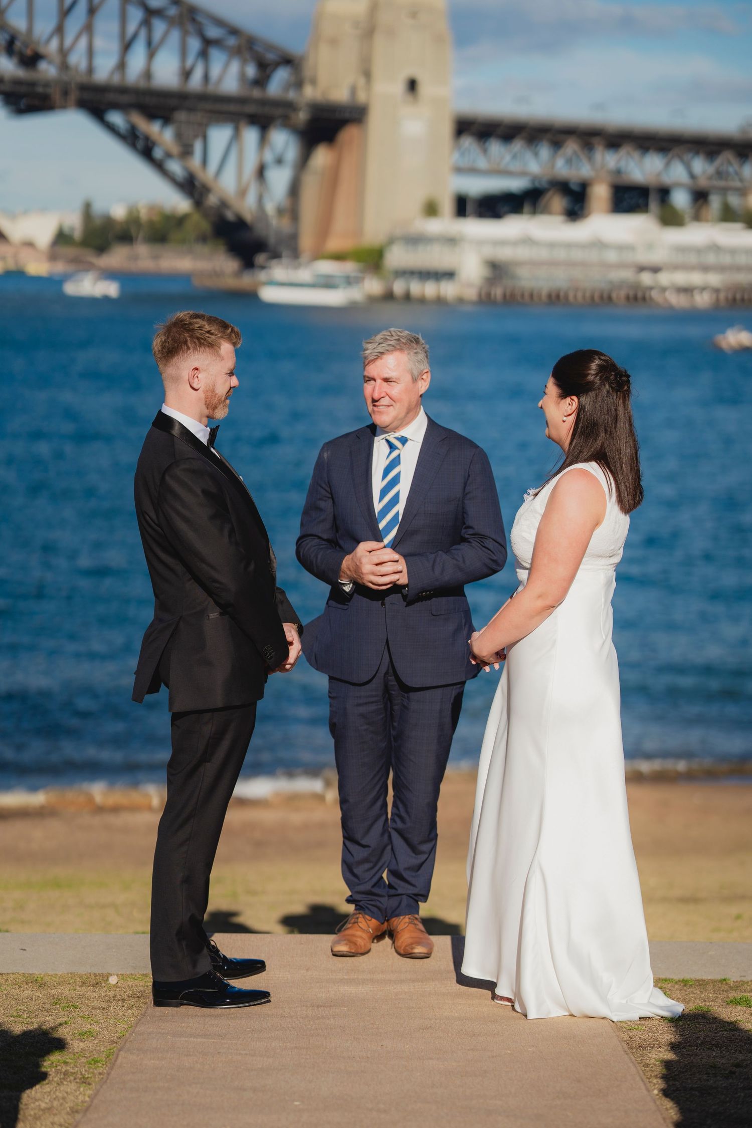 Sydney civil wedding ceremony at Blues Point Reserve, capturing the couple's romantic vows, candid moments and stunning Sydney Harbour views