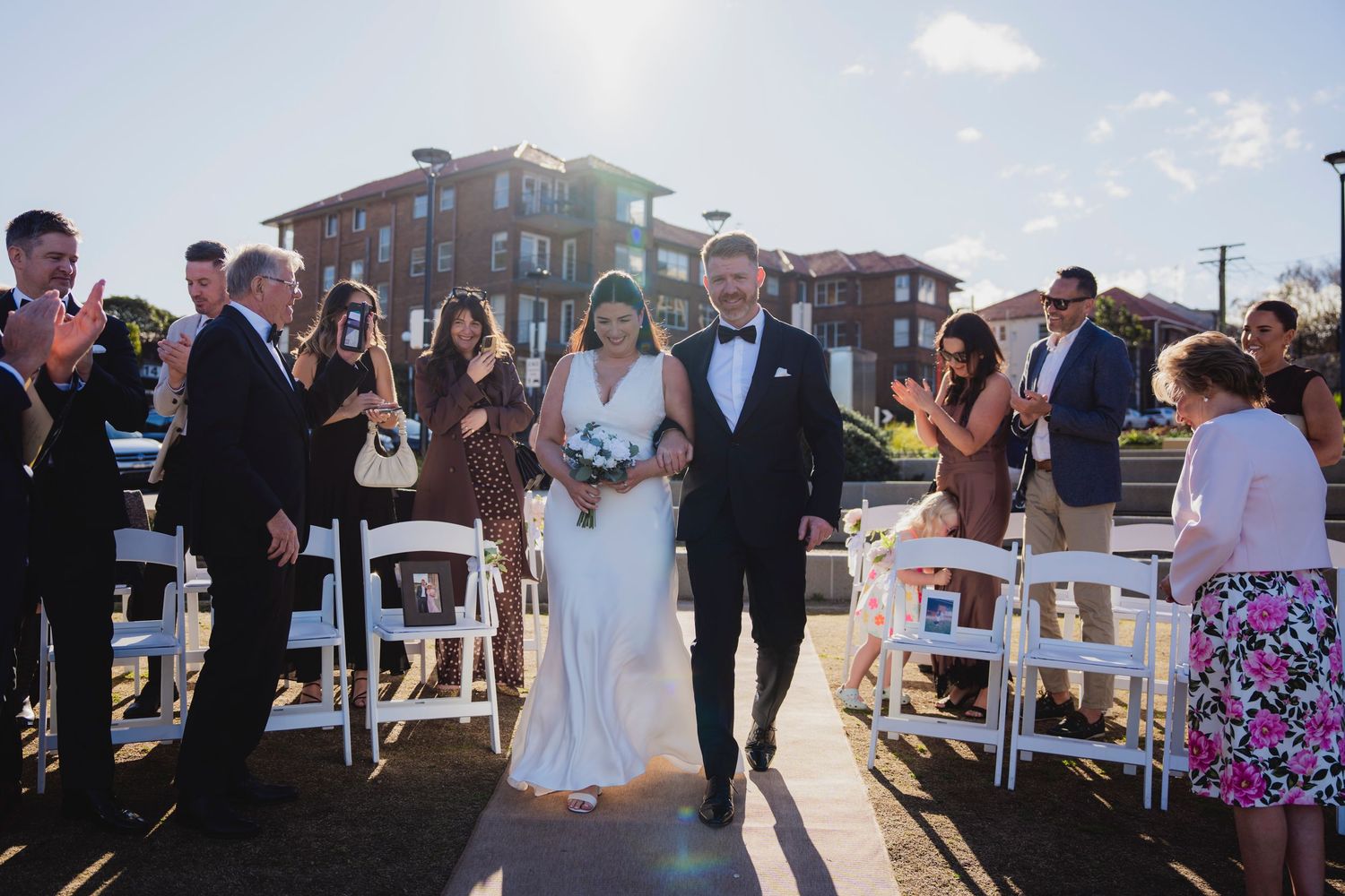 Sydney civil wedding ceremony at Blues Point Reserve, capturing the couple's romantic vows, candid moments and stunning Sydney Harbour views