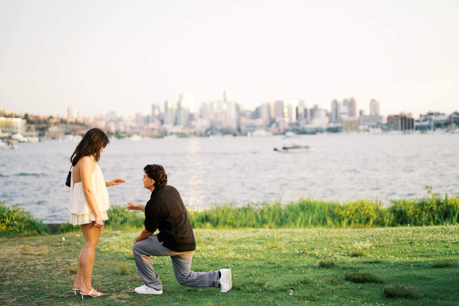 Wide view of the proposal at Gas Works Park with the downtown skyline across the water, Seattle proposal photography