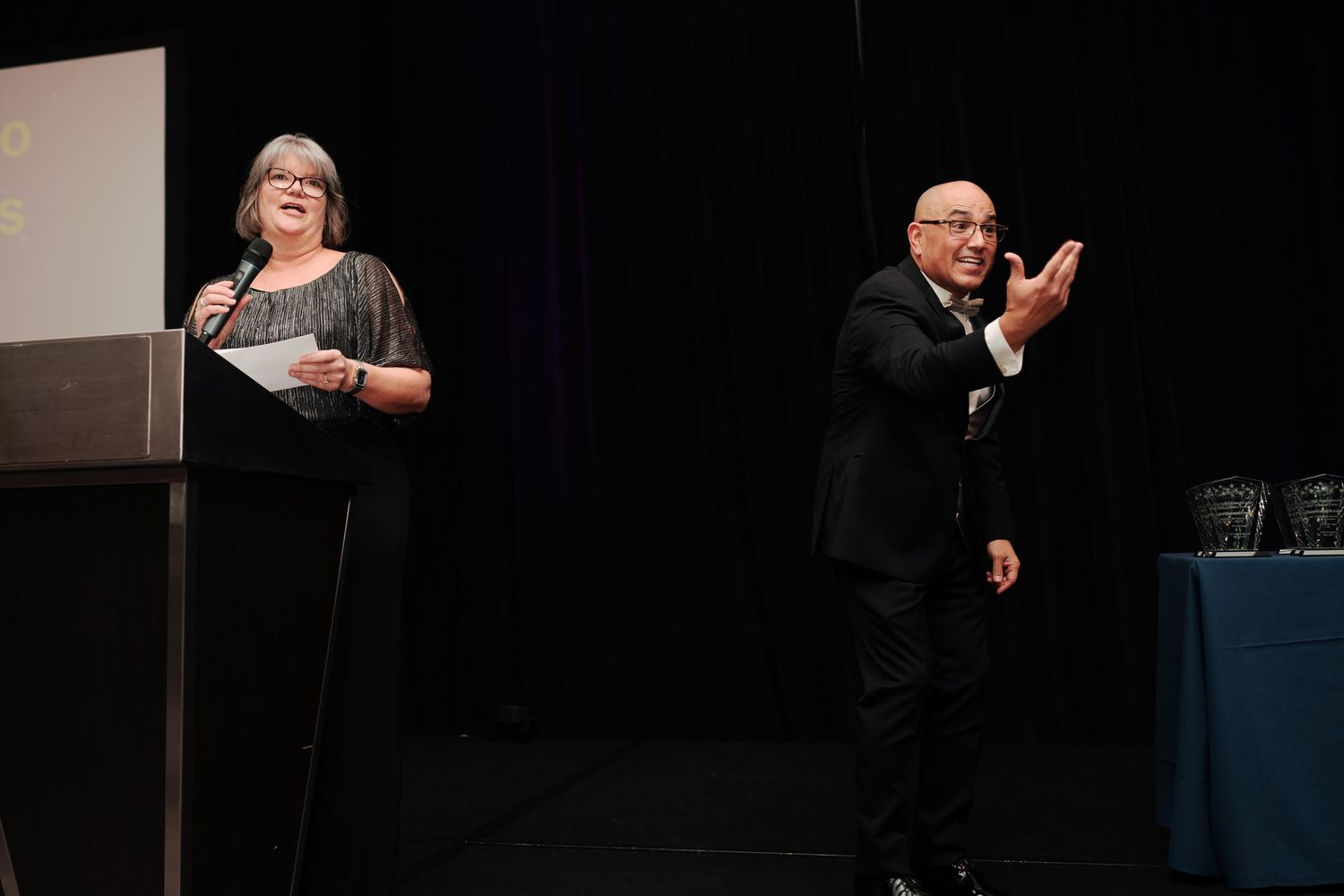 Speaker at the lectern during the State Farm Hall of Fame awards, corporate event photographer in Renton Washington