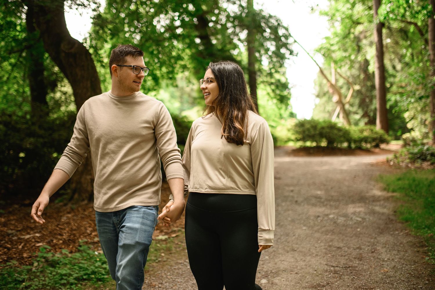 Couple walking the Arboretum path together after the proposal, Arboretum proposal photographer, Seattle