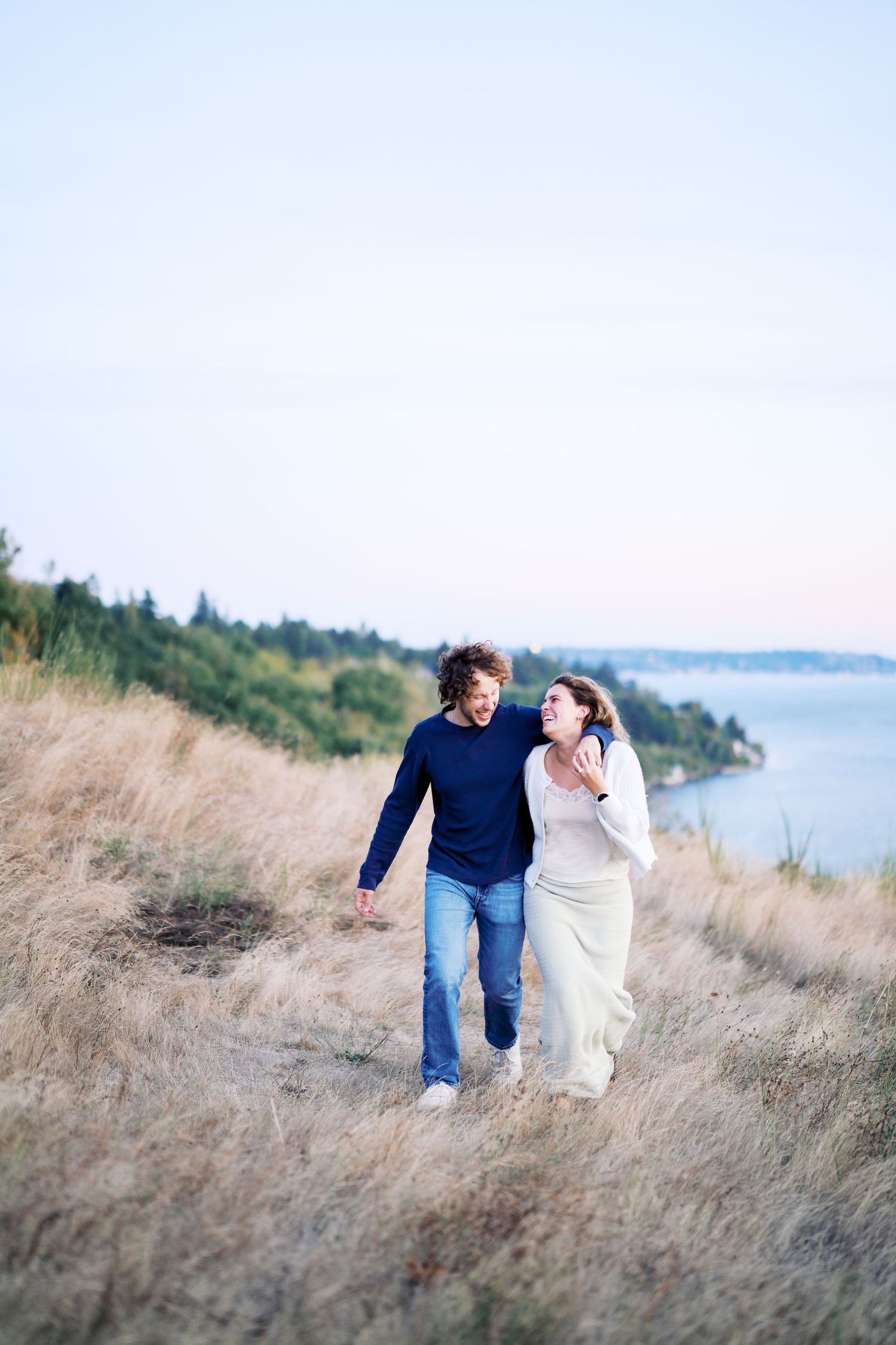 Walking the bluff together before the proposal, Discovery Park proposal photographer, Seattle