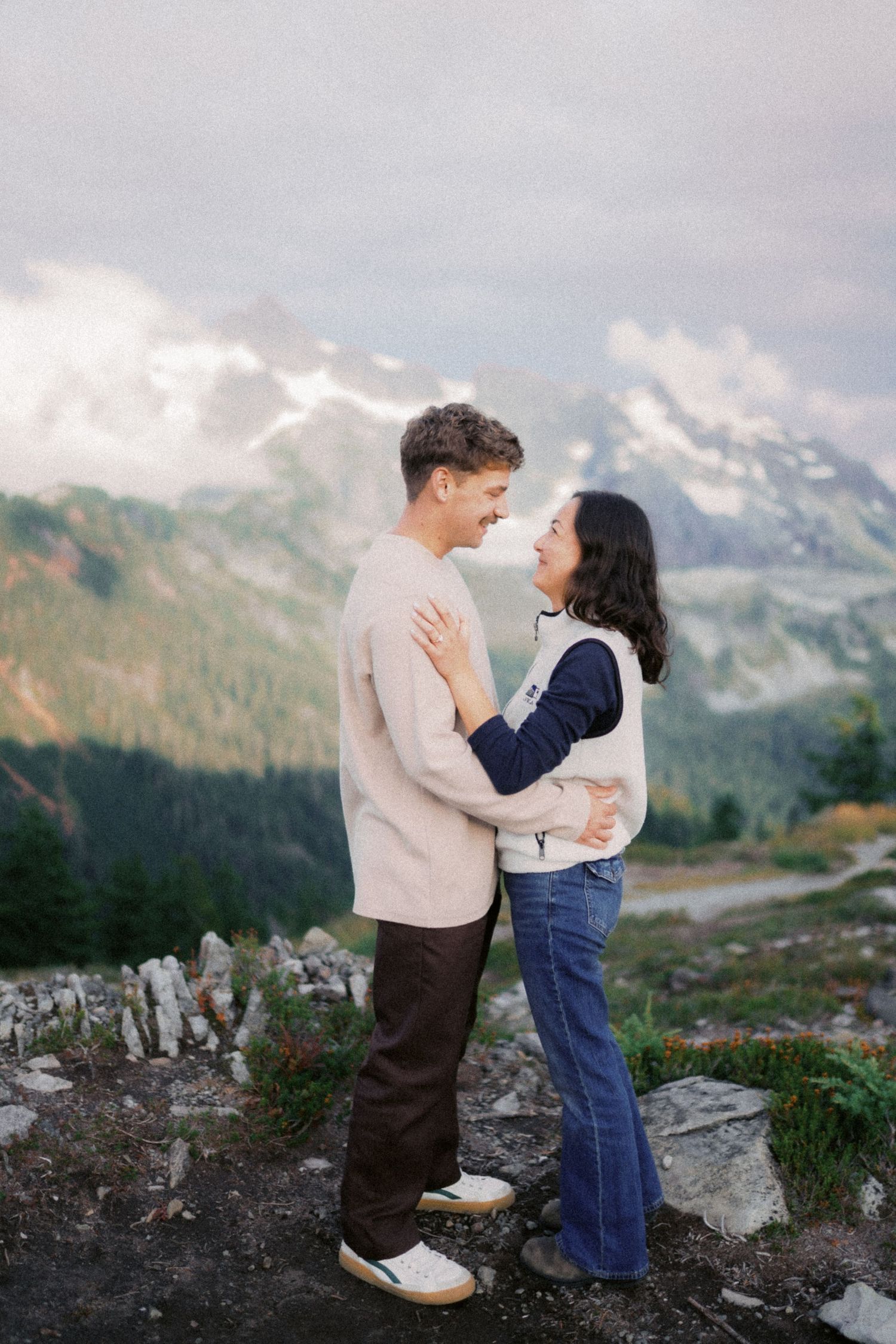 Holding each other with Mt Shuksan behind them, Artist Point proposal photographer, Mt Baker