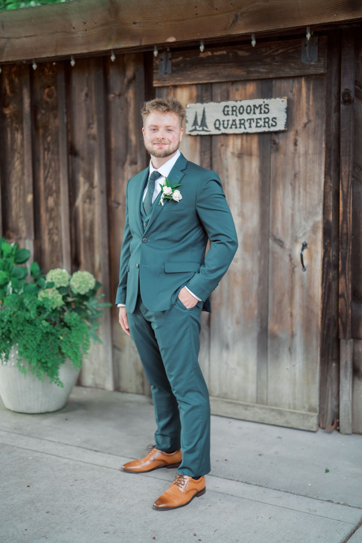 Groom outside the Grooms Quarters barn at The Kelley Farm, Bonney Lake